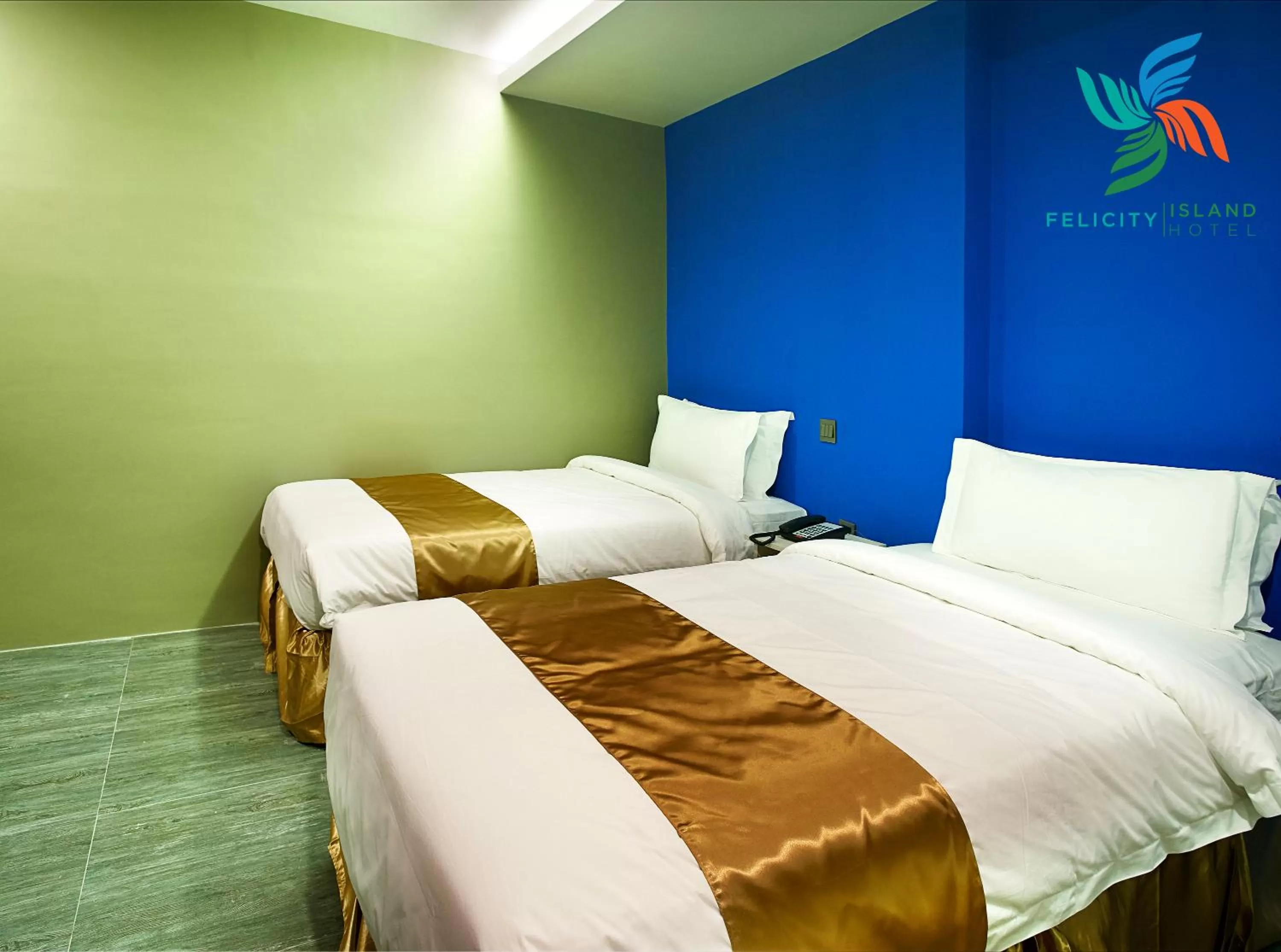 Bed in Felicity Island Hotel