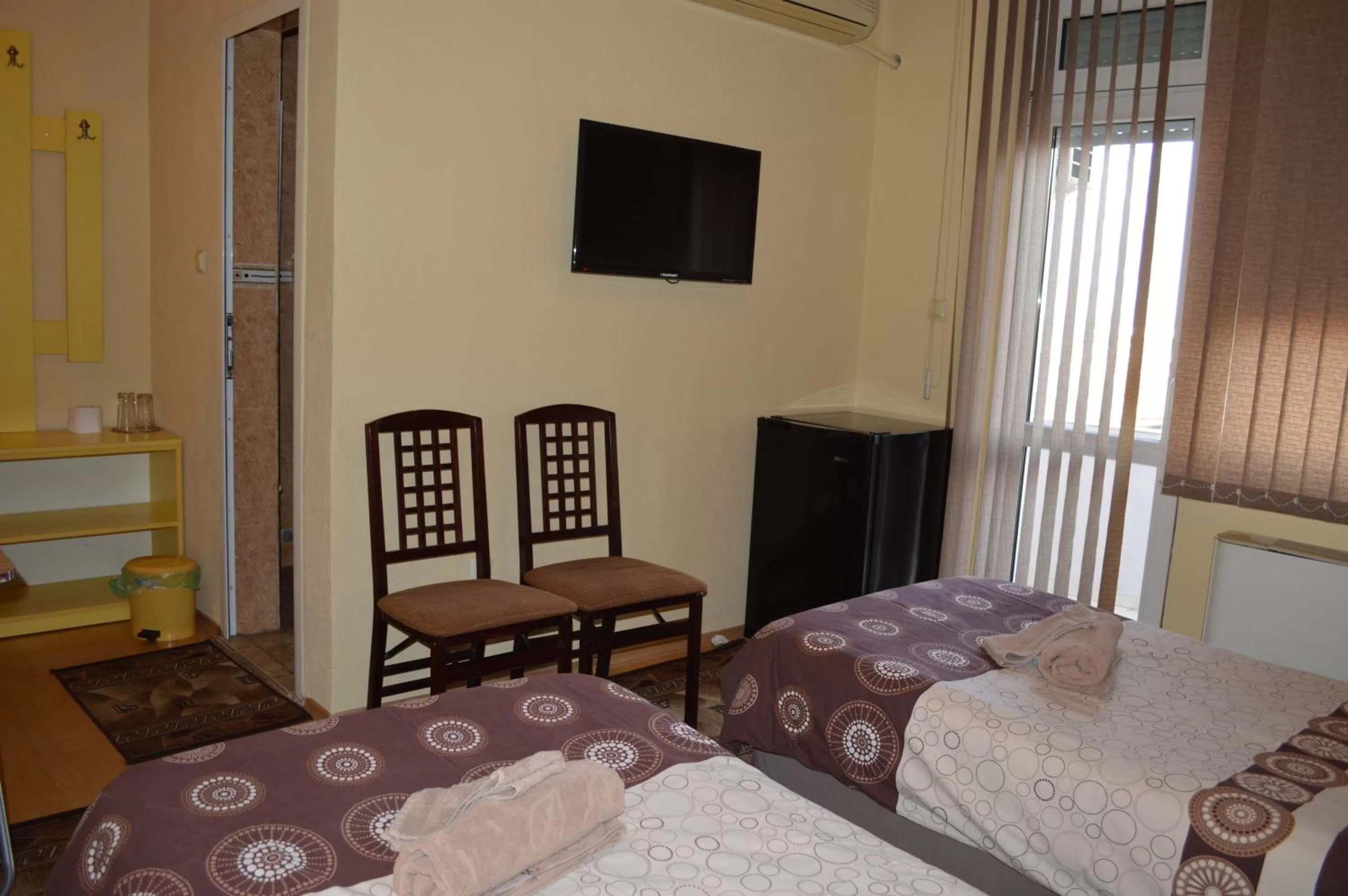 TV/Entertainment Center in Dionis Hotel