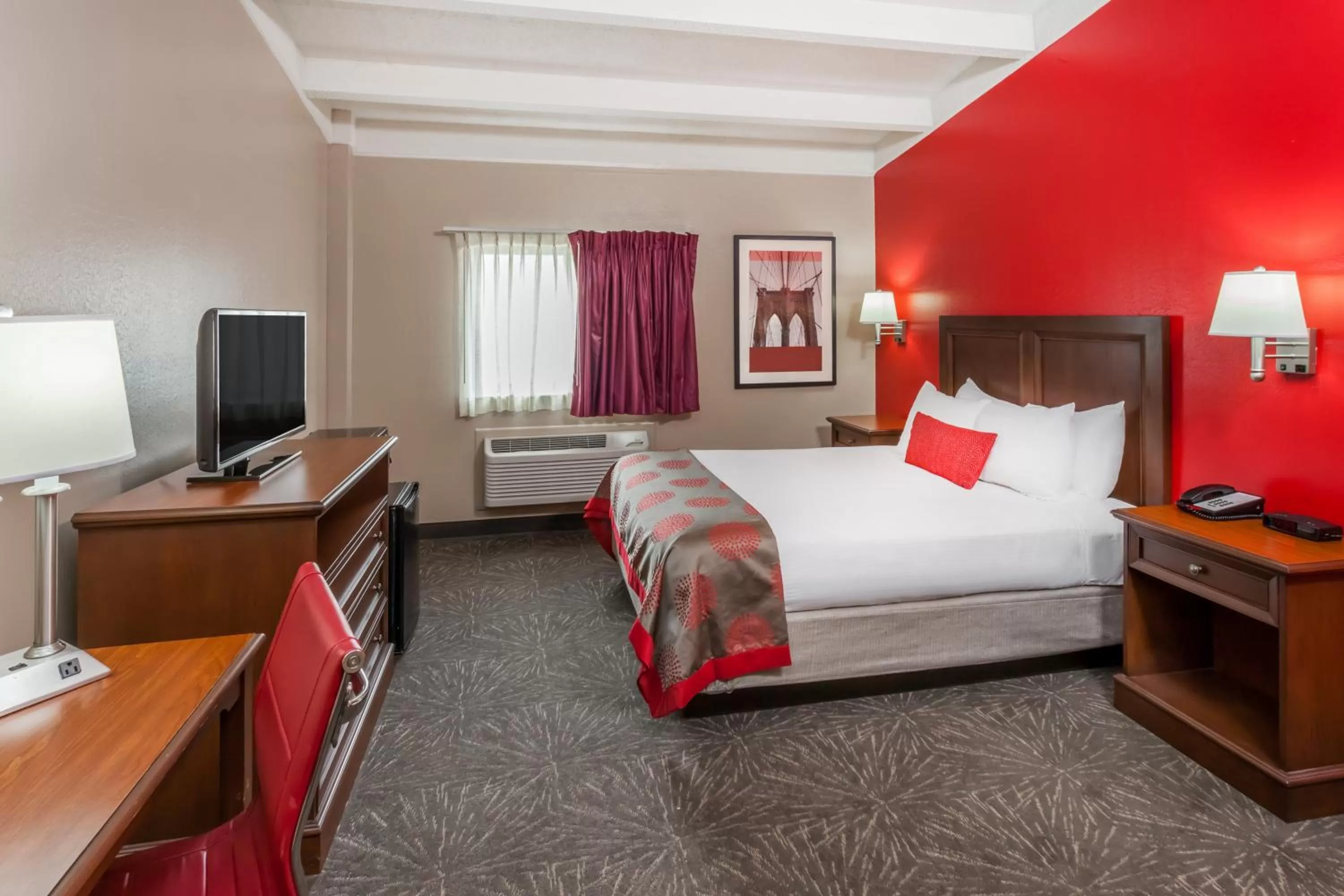 Bed in Ramada by Wyndham Hammond Hotel & Conference Center