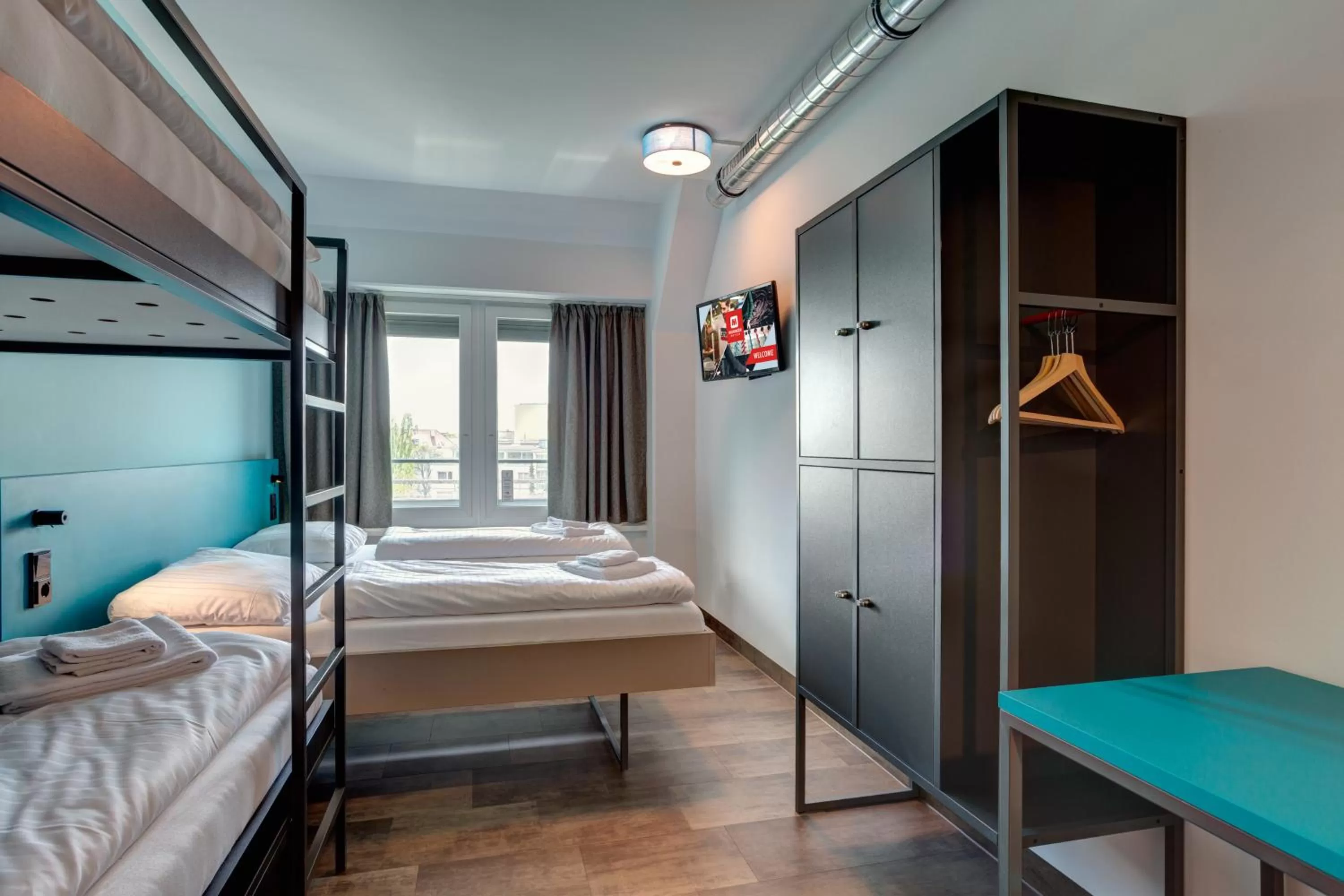 Photo of the whole room, Bed in MEININGER Hotel München Olympiapark