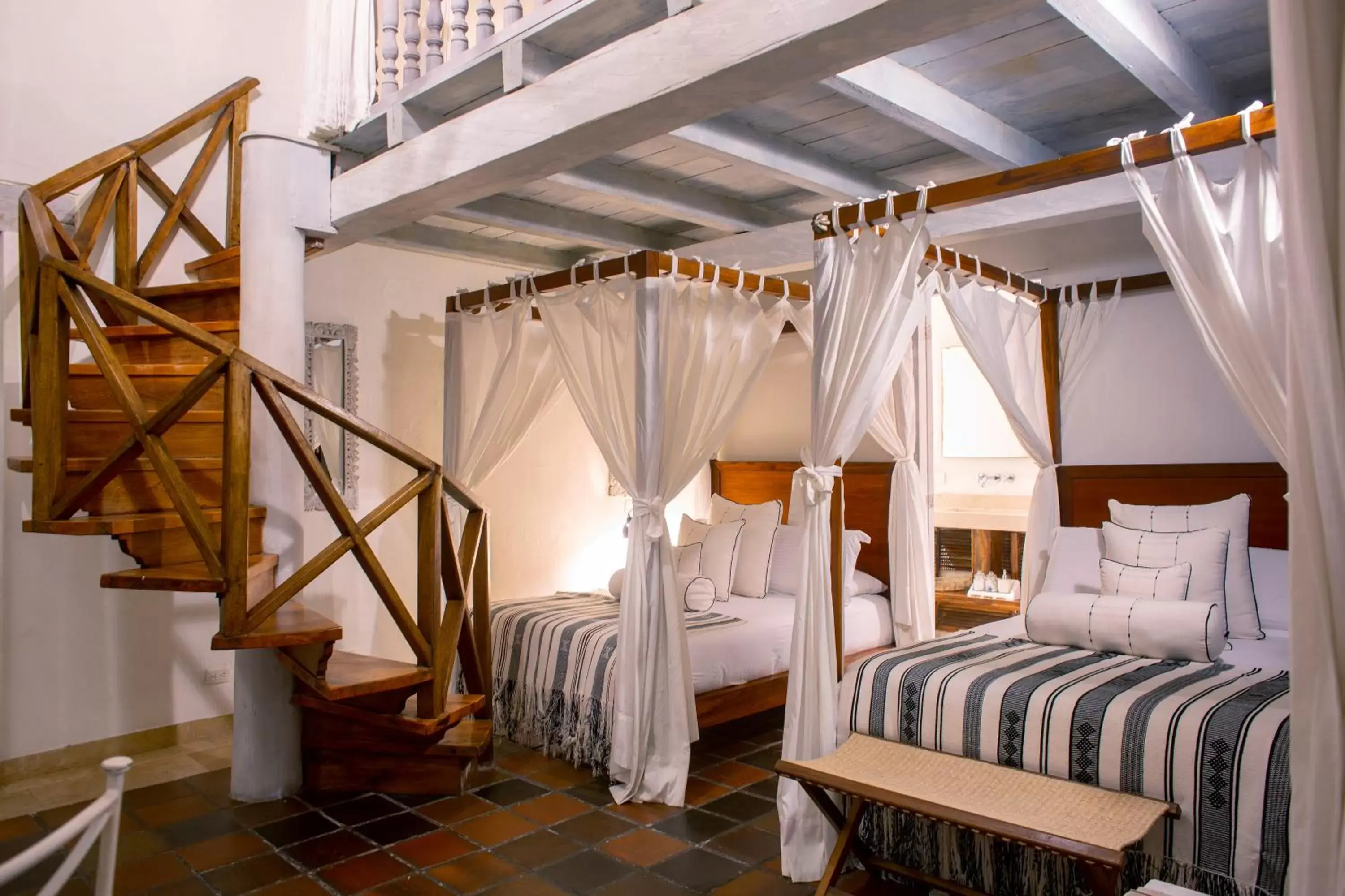 Deluxe Quadruple Room in Leones de Alba Hotel Boutique Deluxe Quadruple Room in Leones de Alba Hotel Boutique