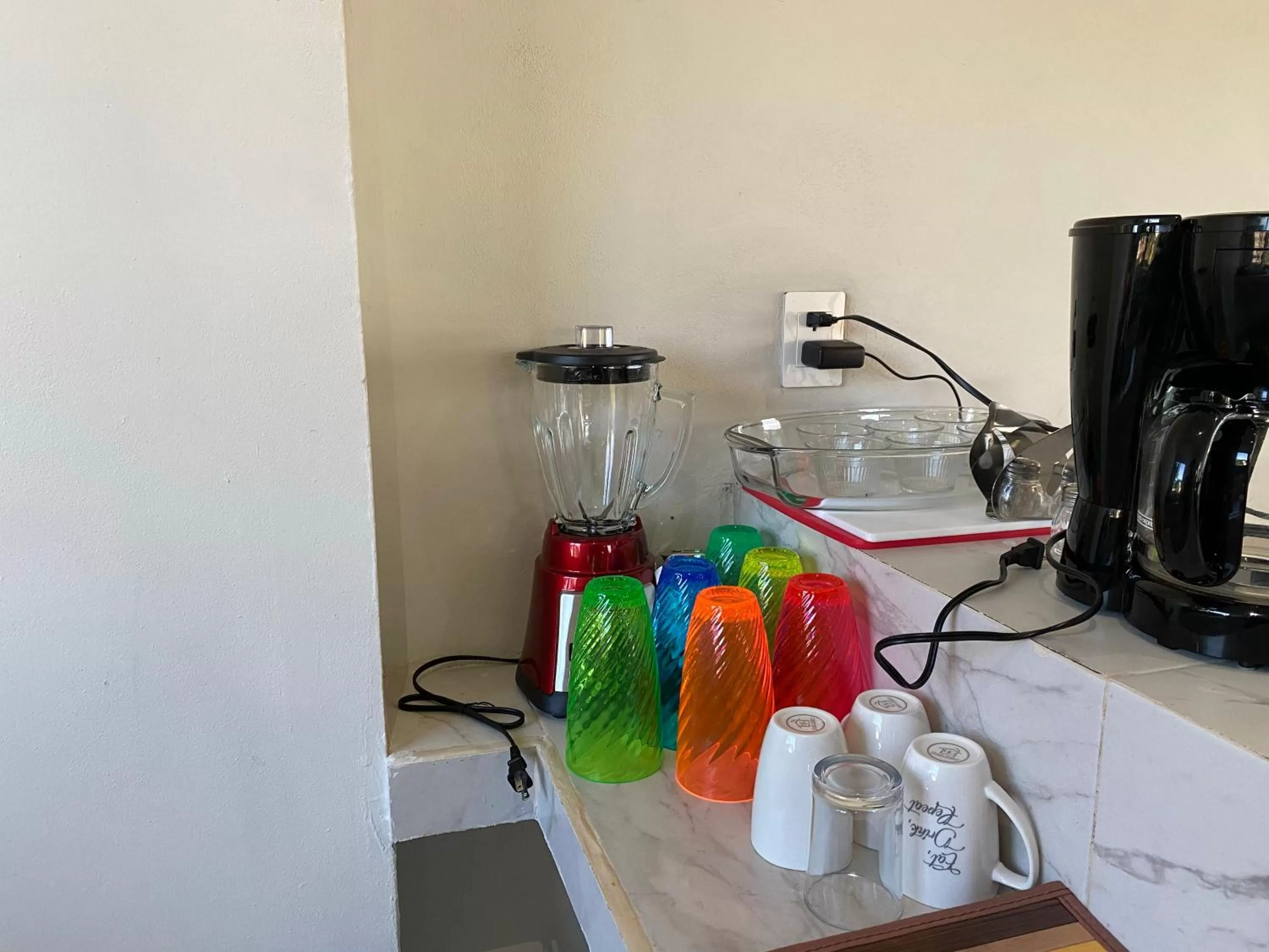 Kitchen or kitchenette in Cuxos Hotel Beachfront