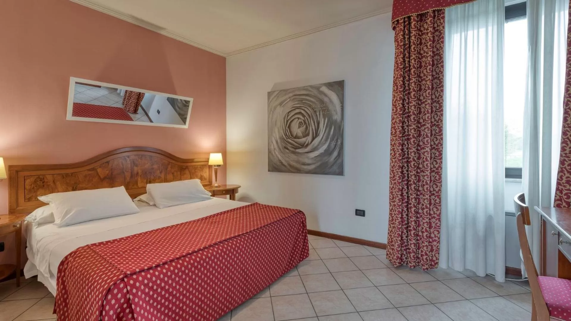 Photo of the whole room, Bed in Primotel Brescia