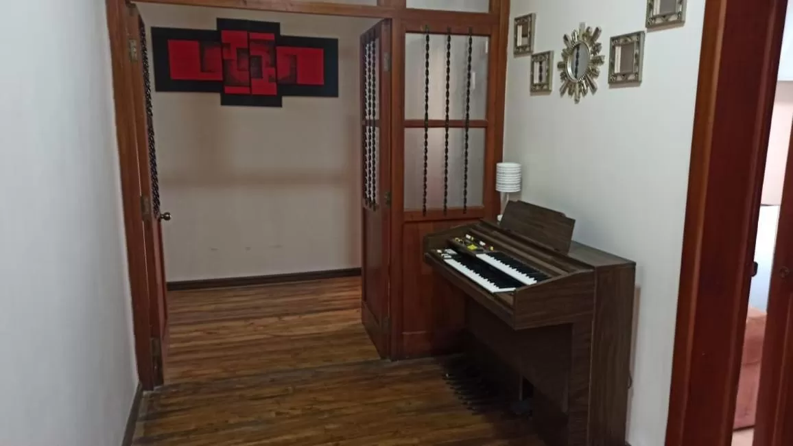 Communal lounge/ TV room in Casa San Benito Hospedaje