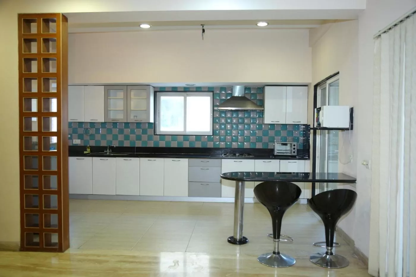 Kitchen/Kitchenette in Swan Suites Madhapur