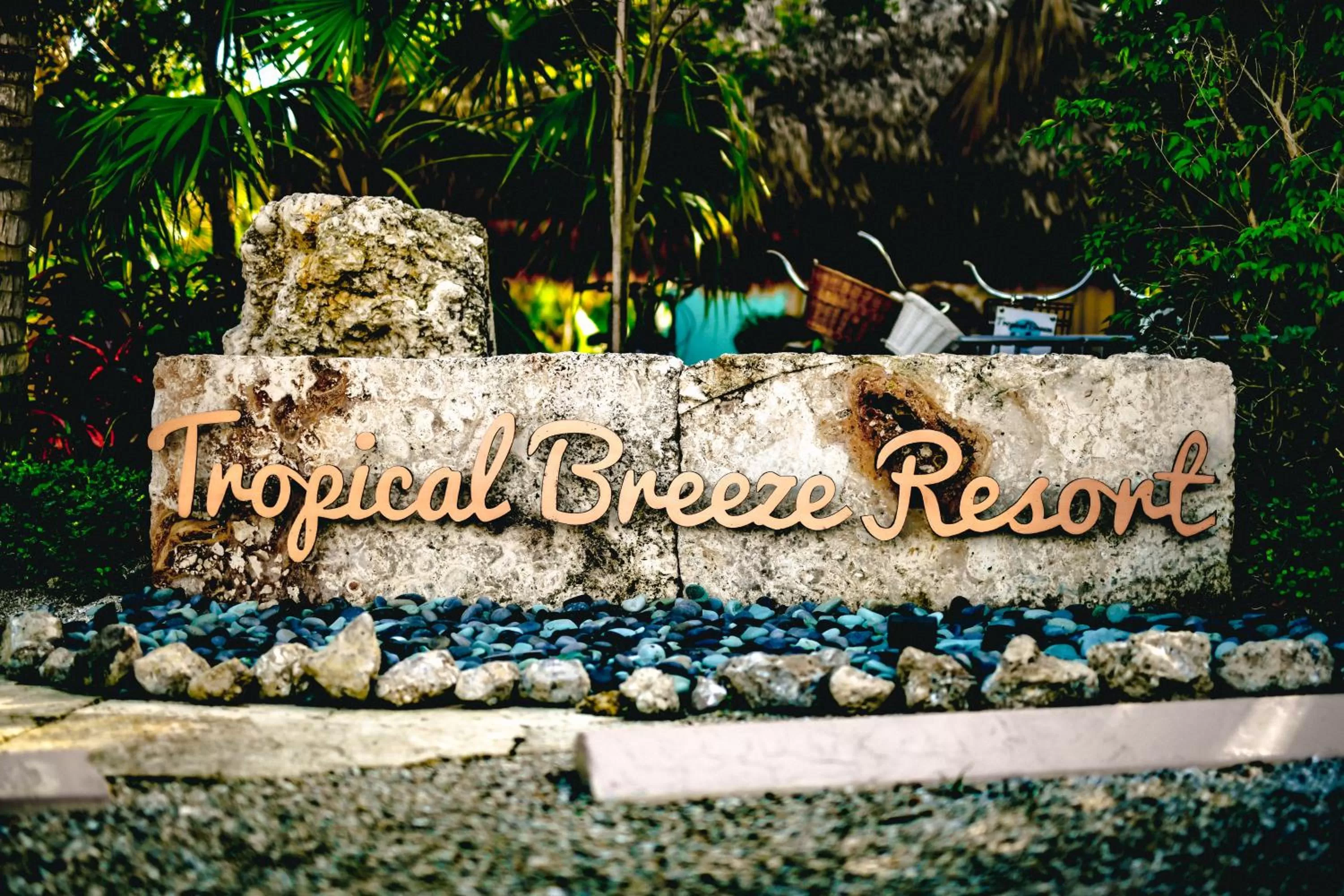Property logo or sign in Tropical Breeze Resort