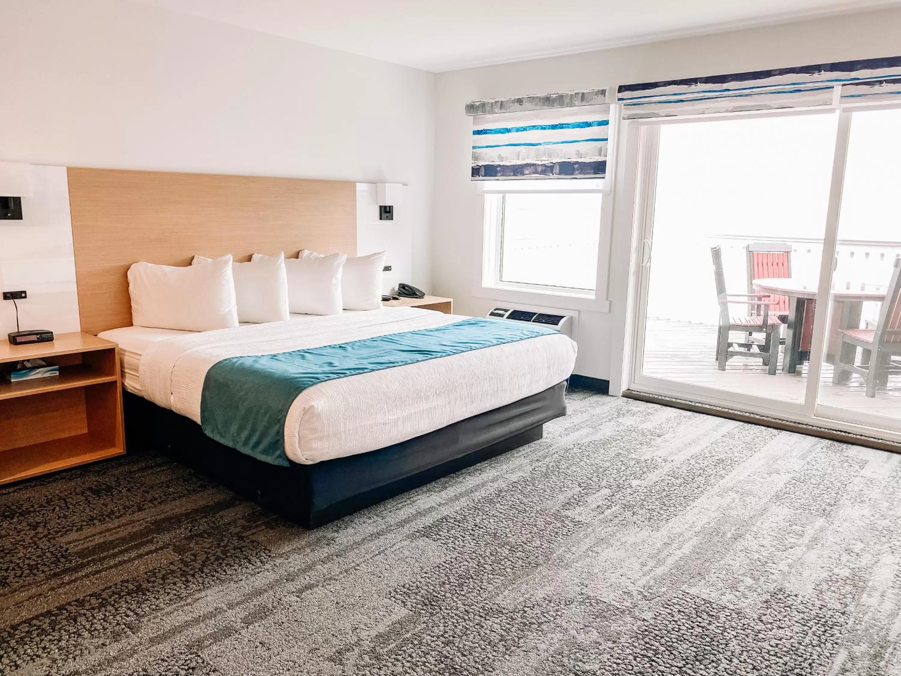 Bed in La Place Rendez-Vous Hotel