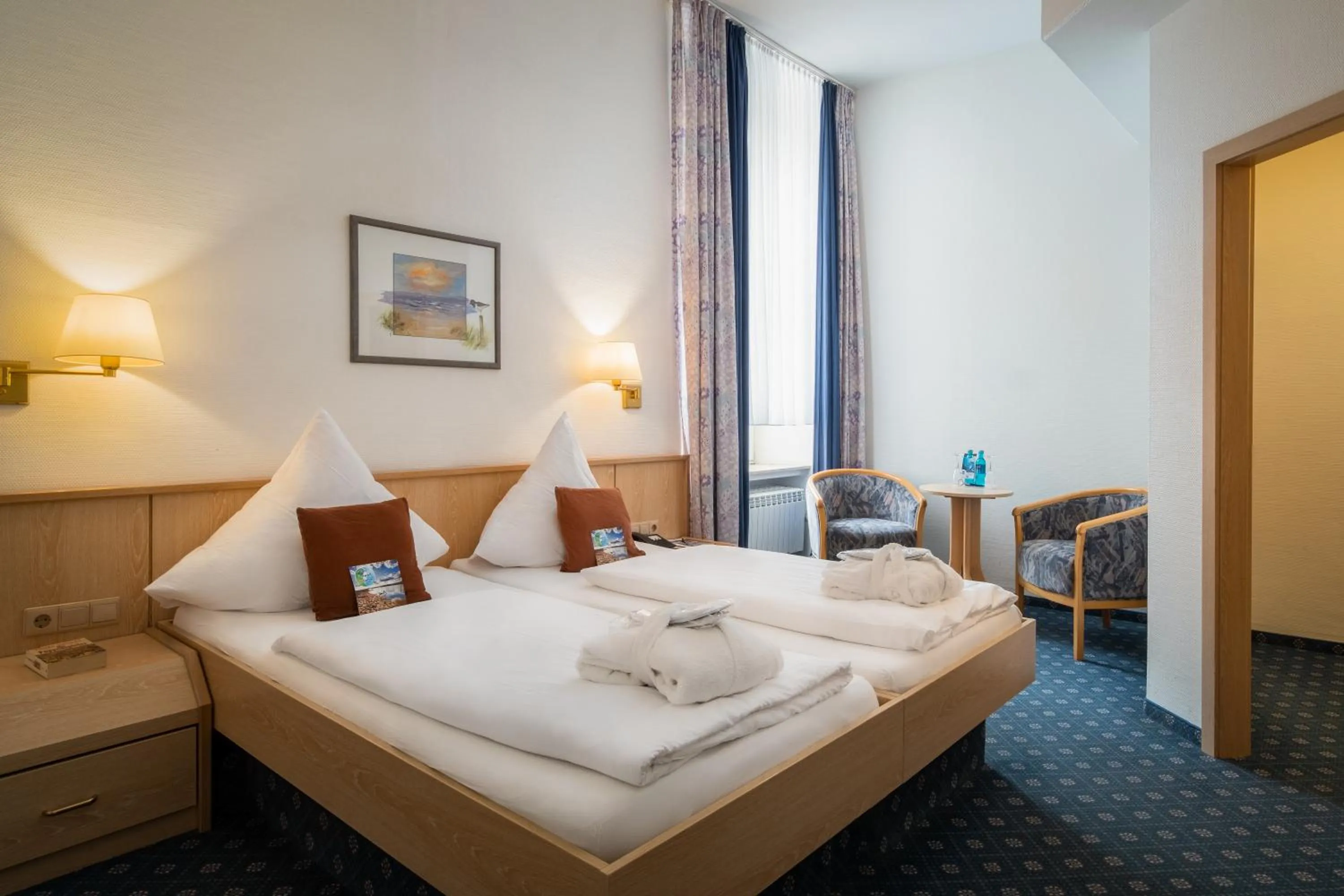 Photo of the whole room, Bed in Nordsee Hotel Borkum