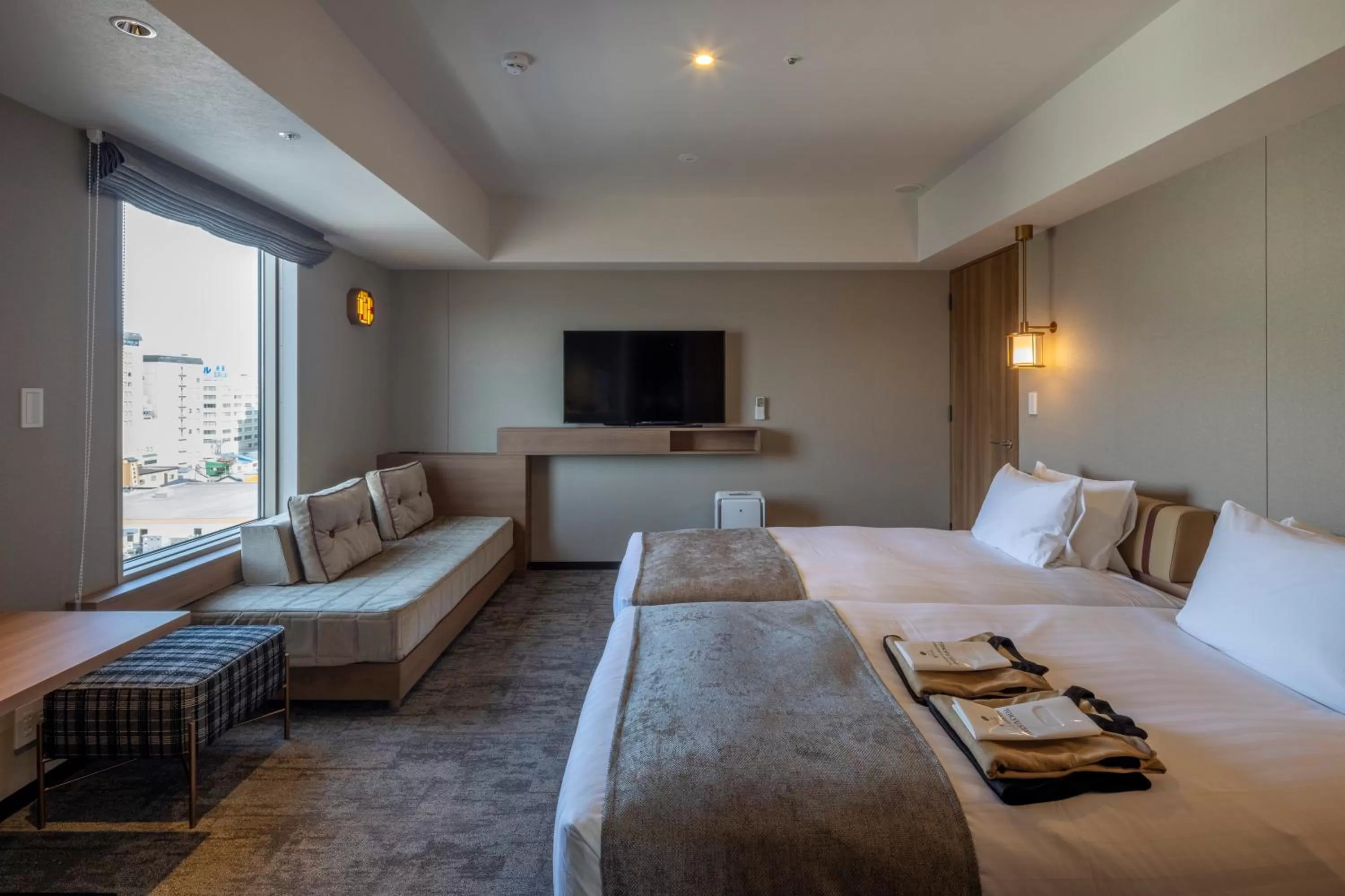 Bed in Tokyu Stay Hakodate Asaichi Akarinoyu