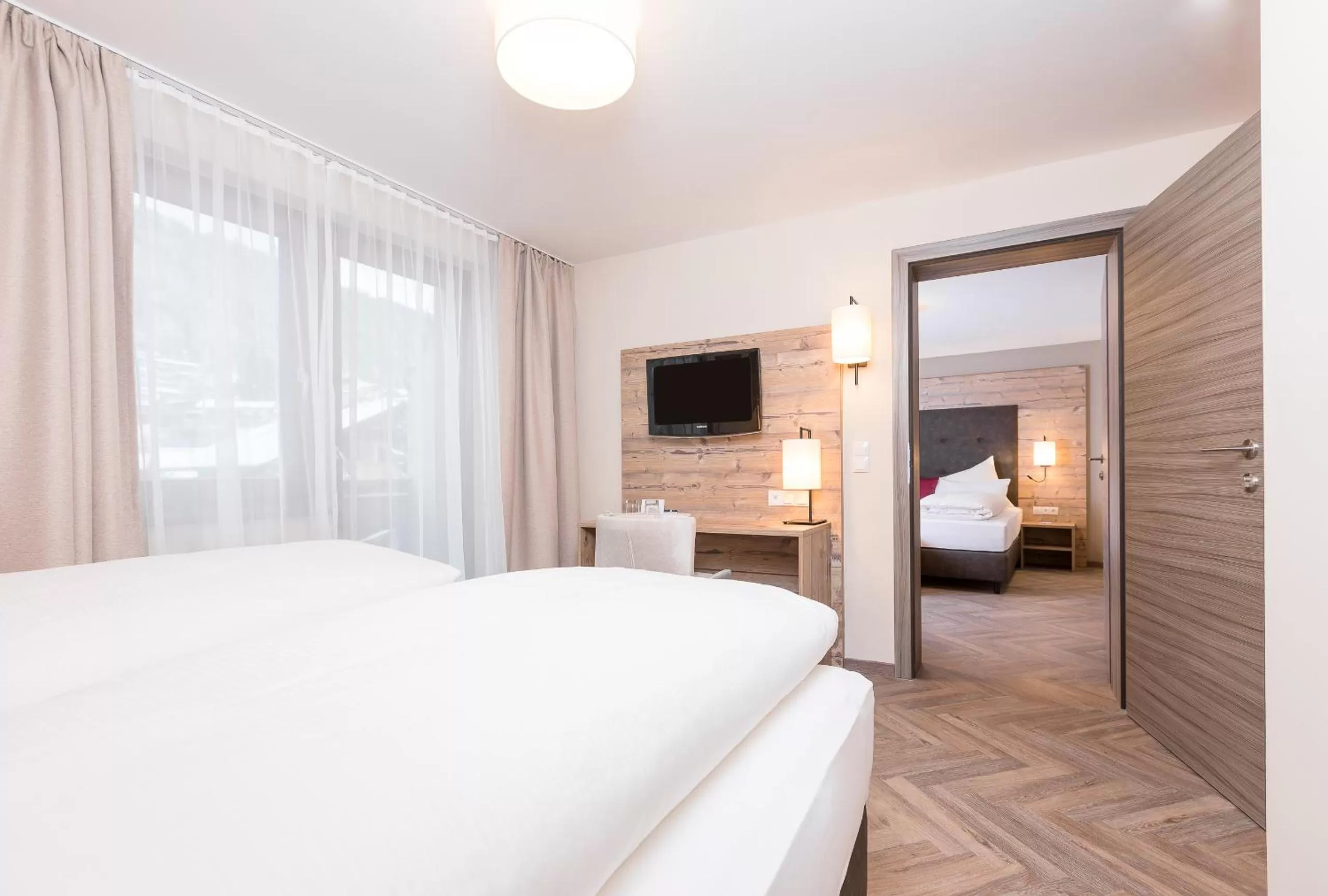 Bed in Alpenhotel Tirolerhof