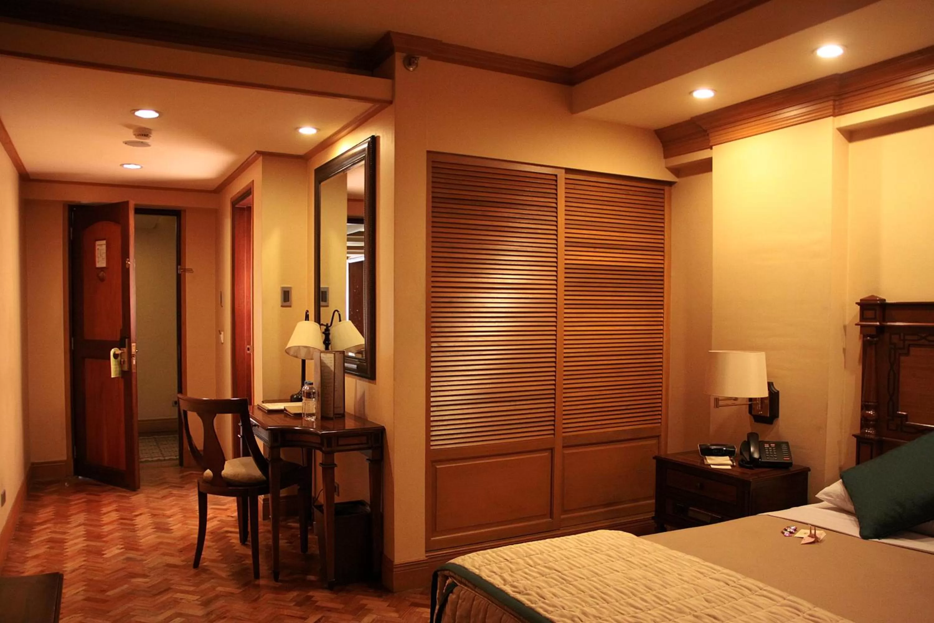 Seating area, Bed in Herald Suites