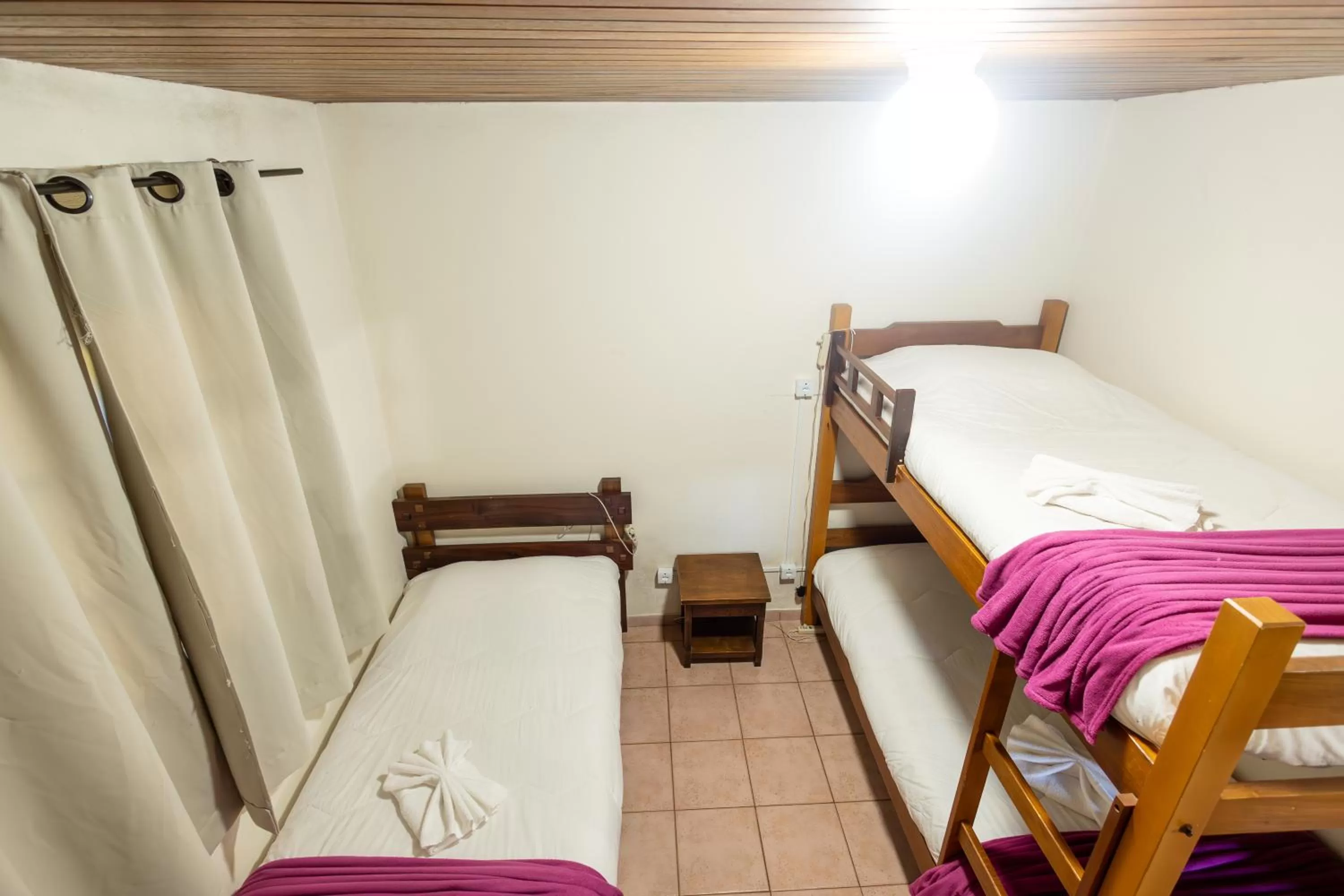 Bed in Chalés 3 Pinheiros