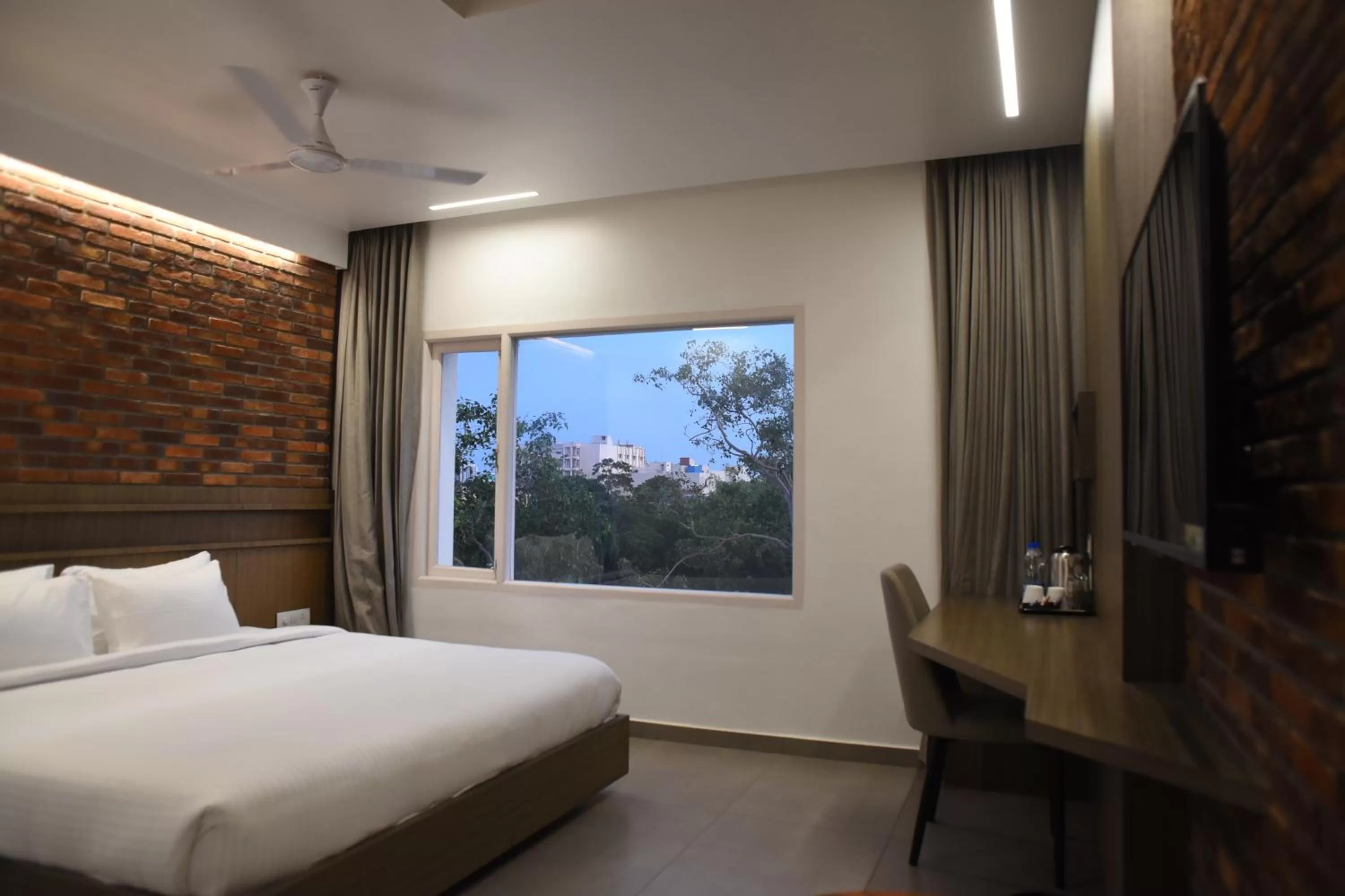 Photo of the whole room, Bed in RATHNA RESIDENCY - Near US CONSULATE