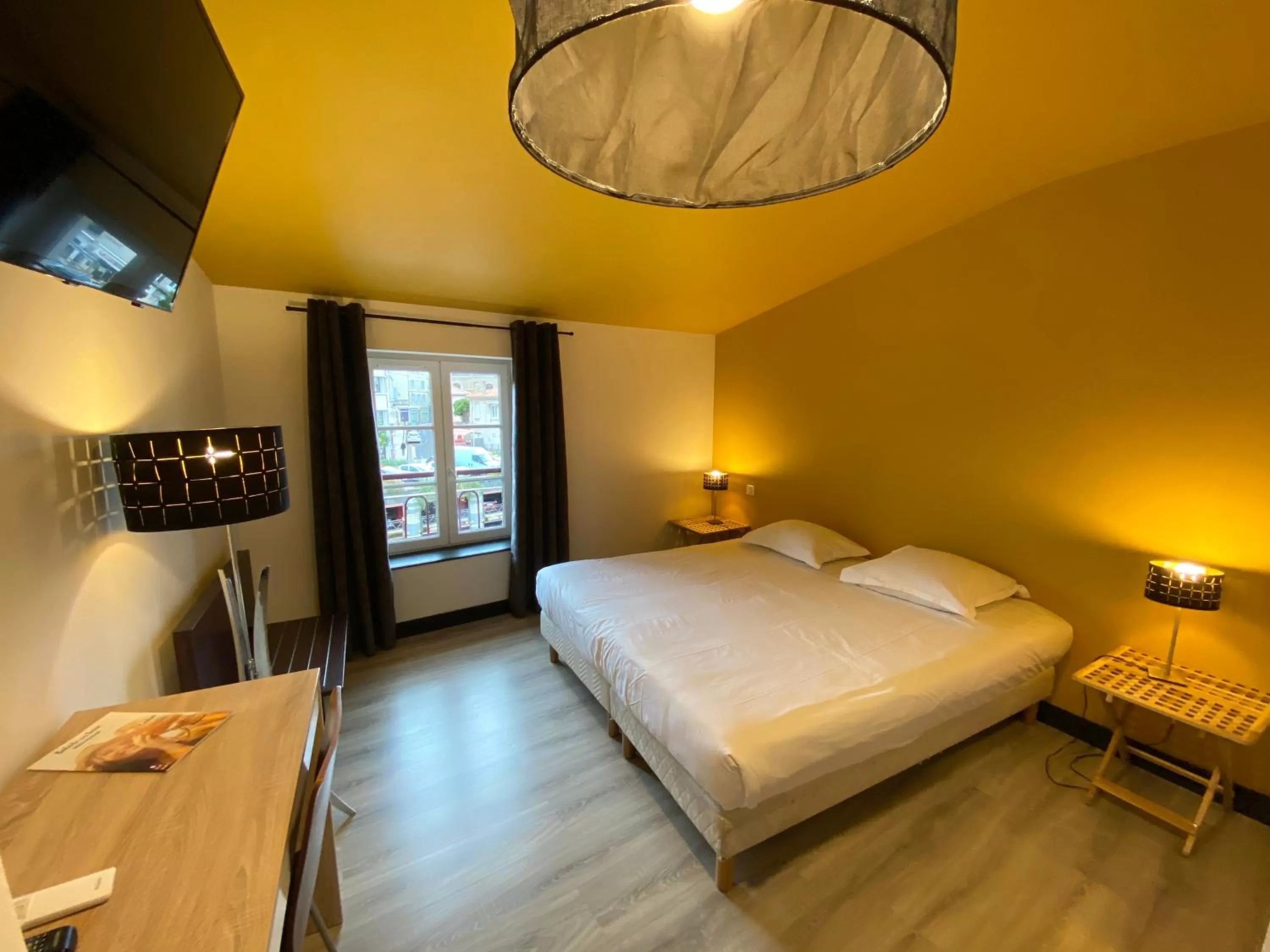 Bedroom in Le Miredames Hôtel-Bar