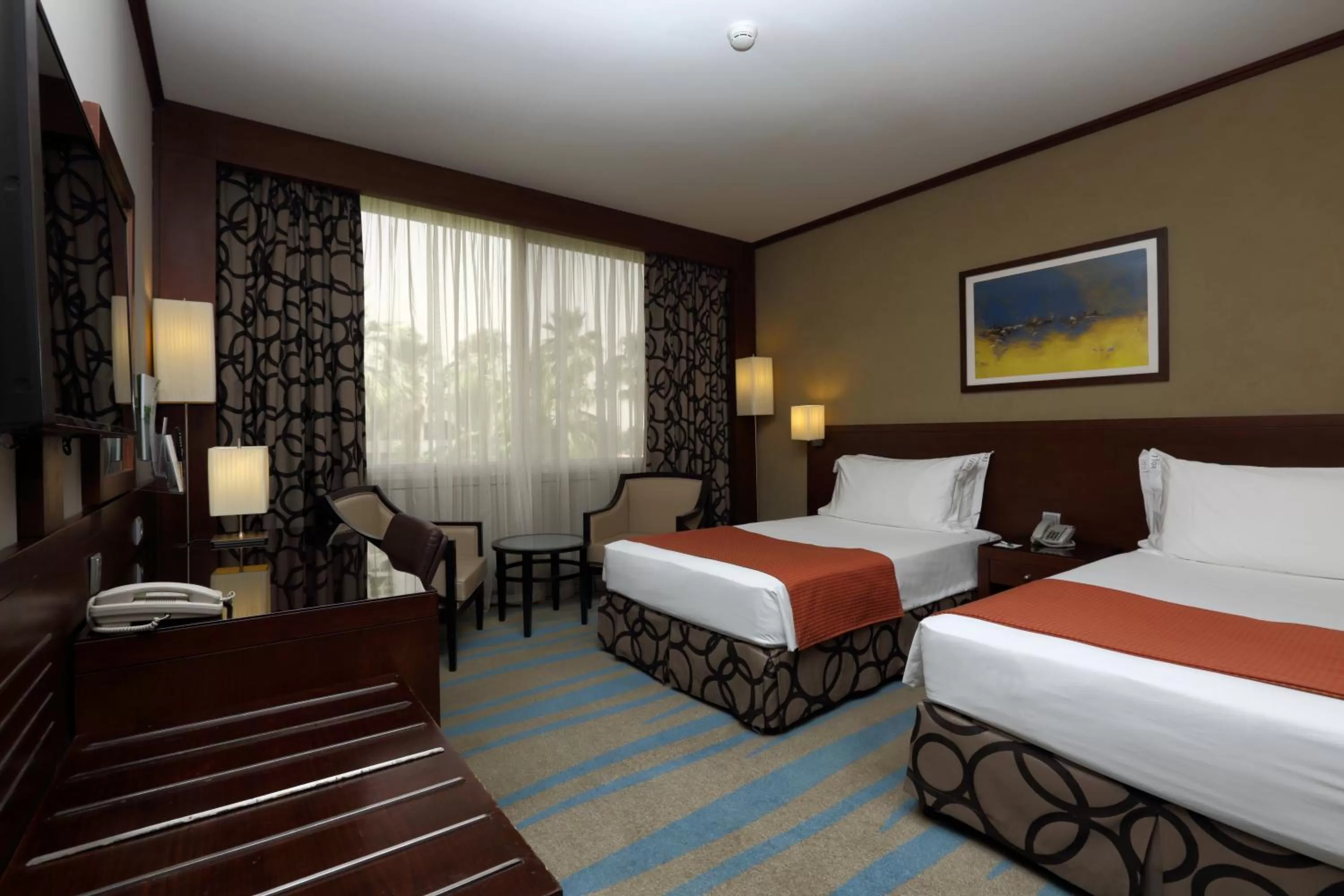 Photo of the whole room, Bed in Holiday Inn Riyadh Izdihar by IHG