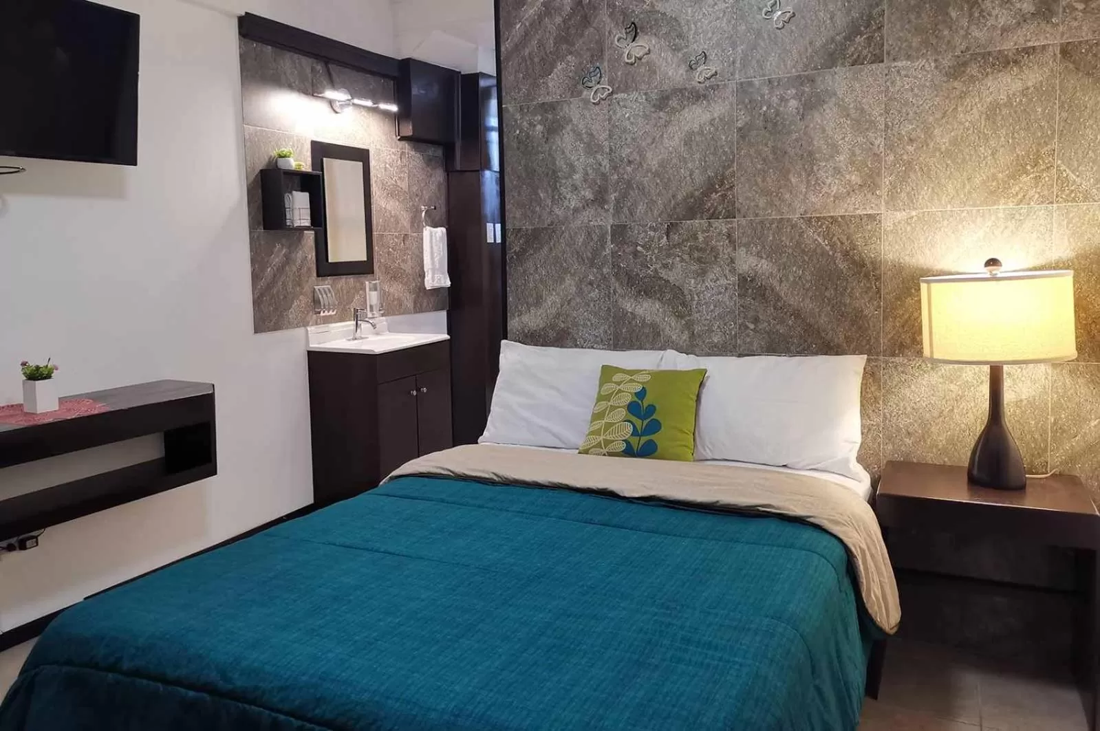 Bed in Cabo Tortuga Hotel Boutique