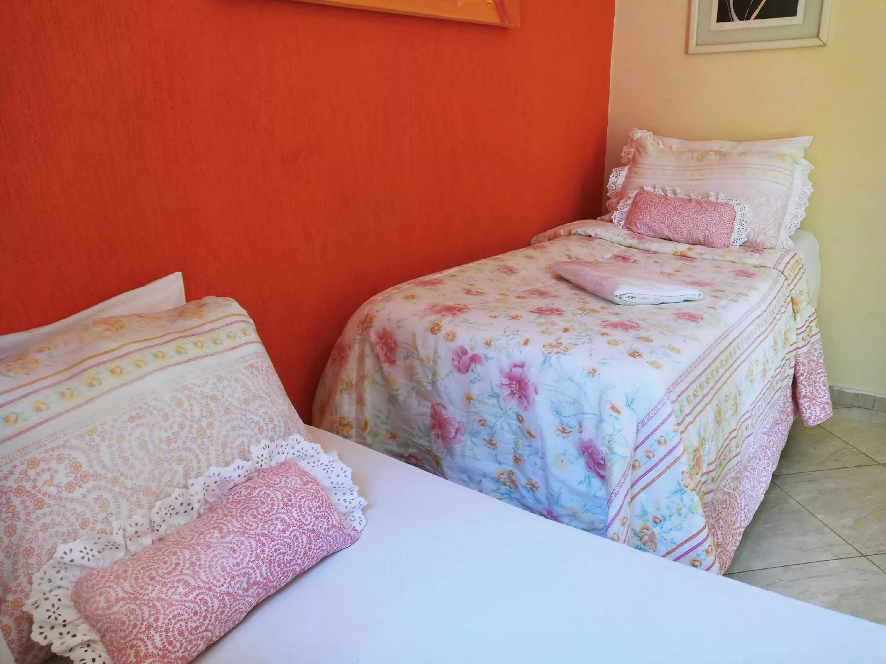 Bed in Pousada Luzes de Geribá