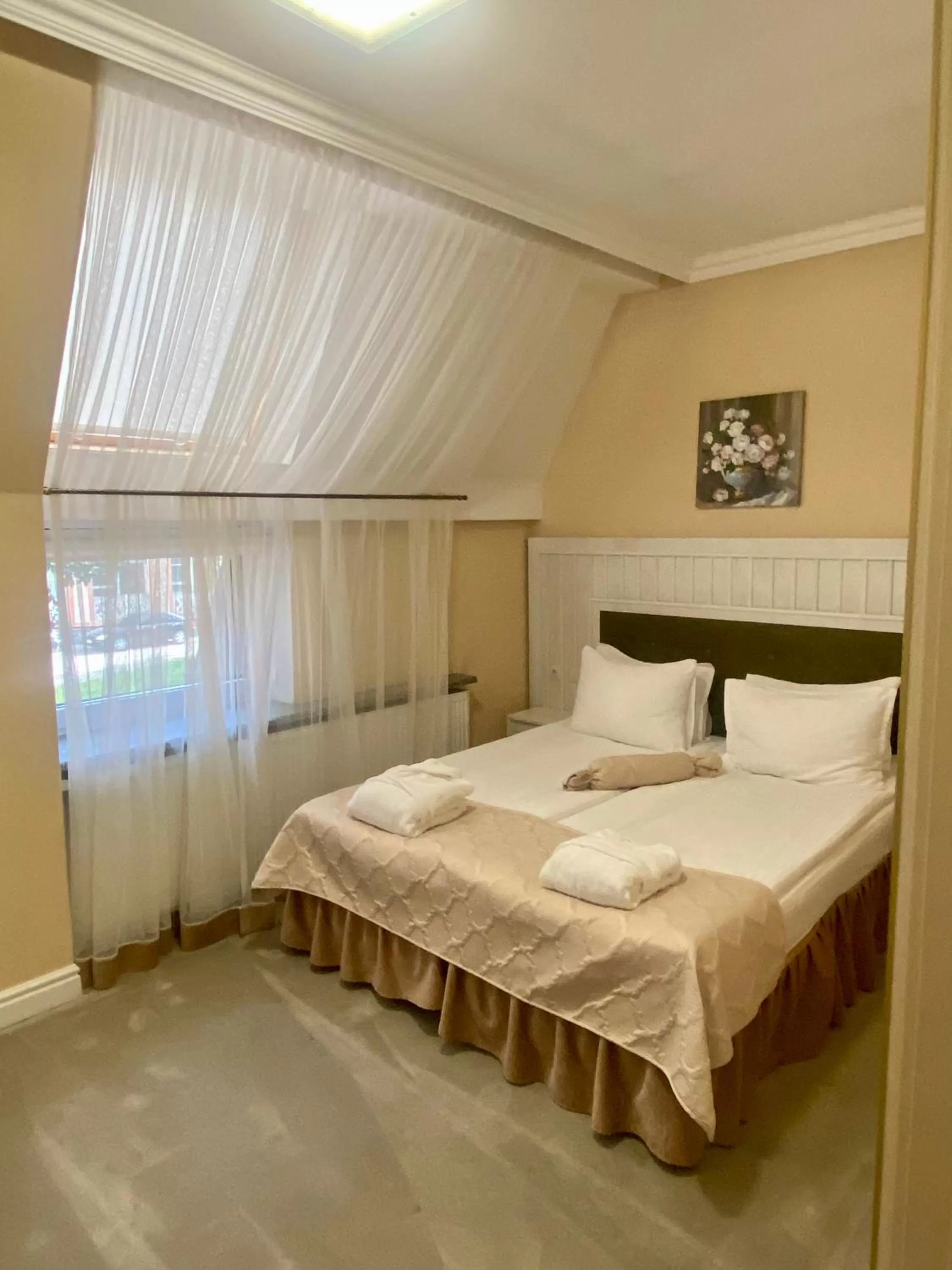 Photo of the whole room, Bed in Boutique Hotel Deluxe