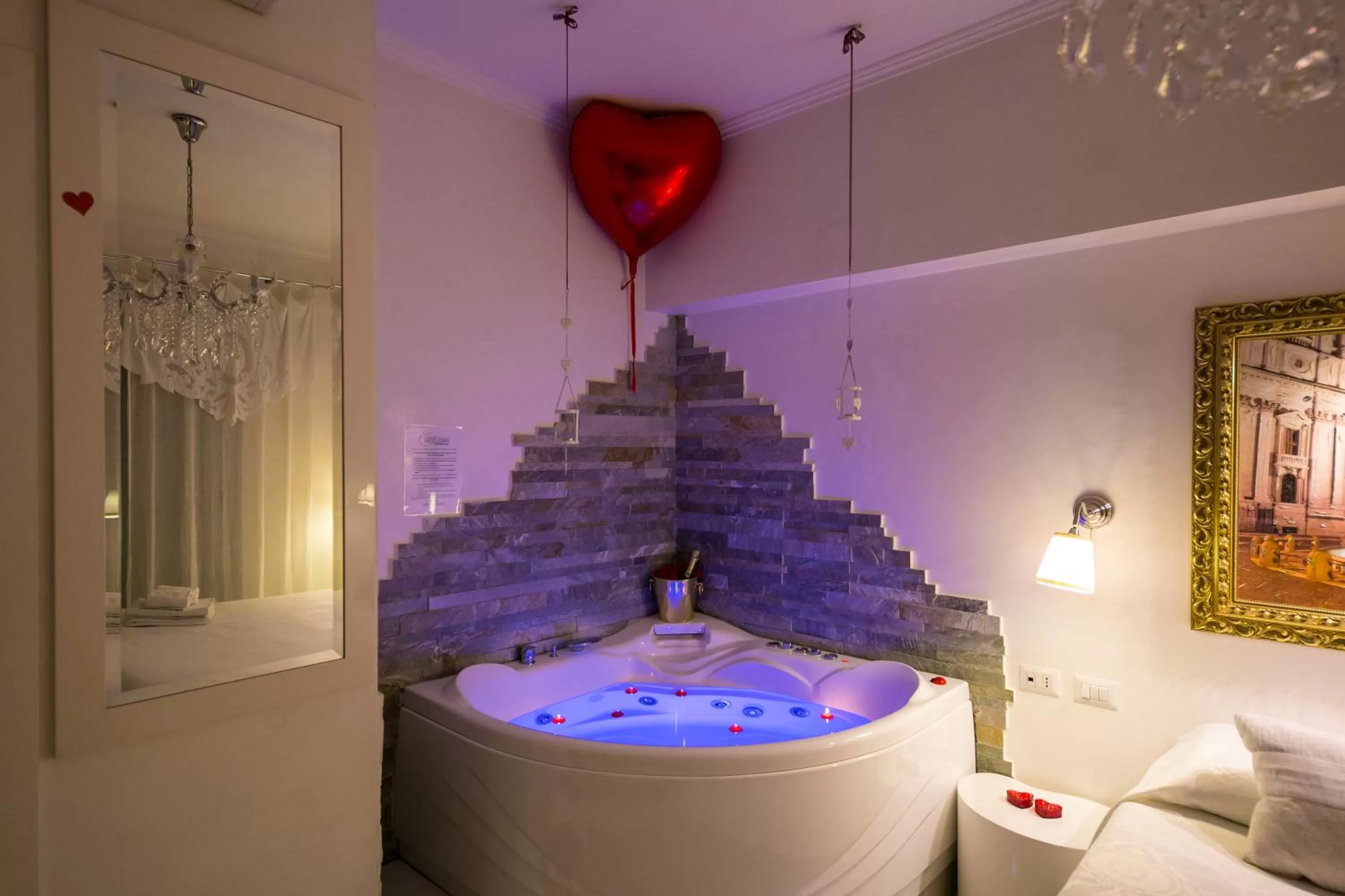 Photo of the whole room in Suites Roma Tiburtina