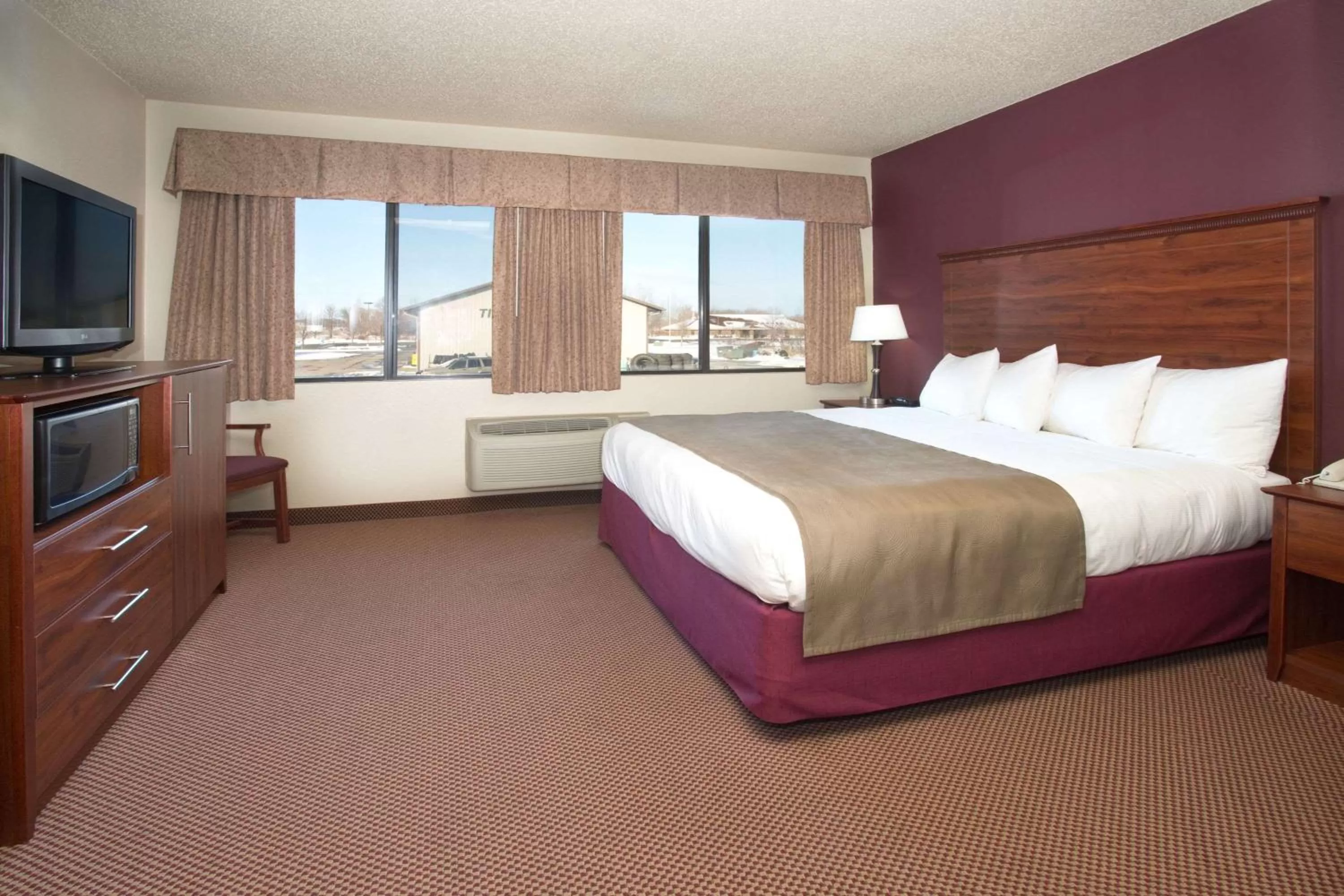 Photo of the whole room, Bed in AmericInn by Wyndham New London