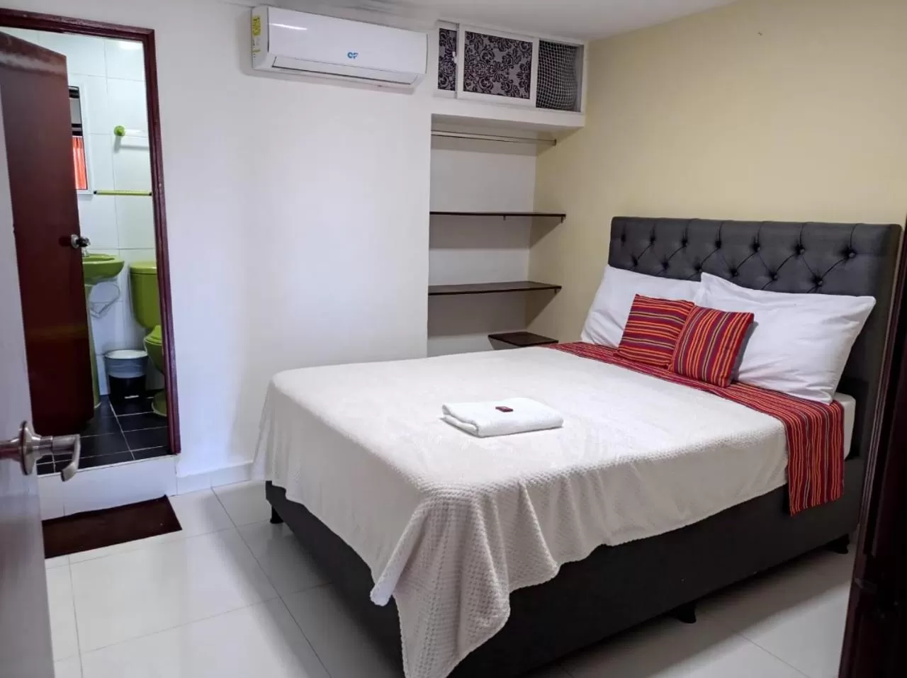 Bed in ANAJIRAWAA HOTEL