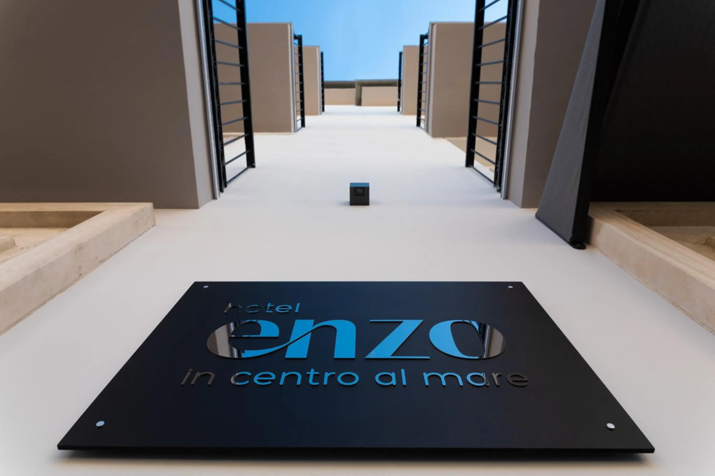 Property logo or sign in Hotel Enzo