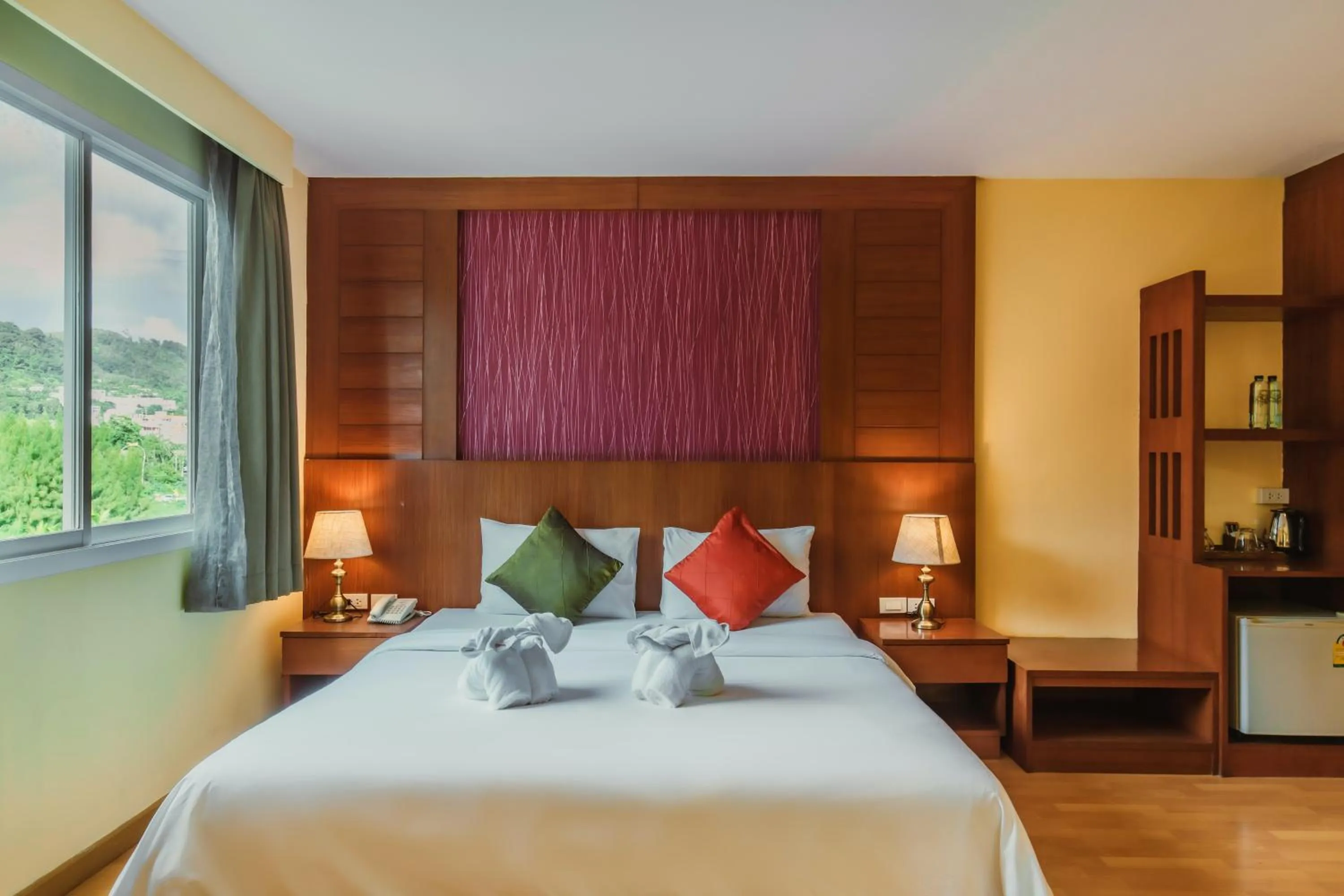 Bed in Elite Suites Patong