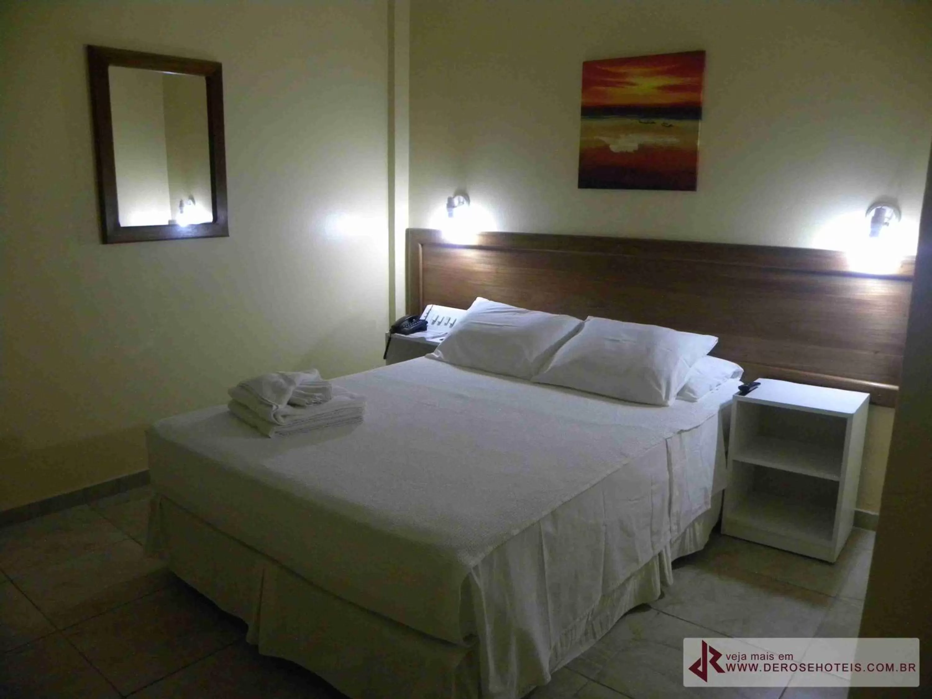 Bed in De Rose Palace Hotel