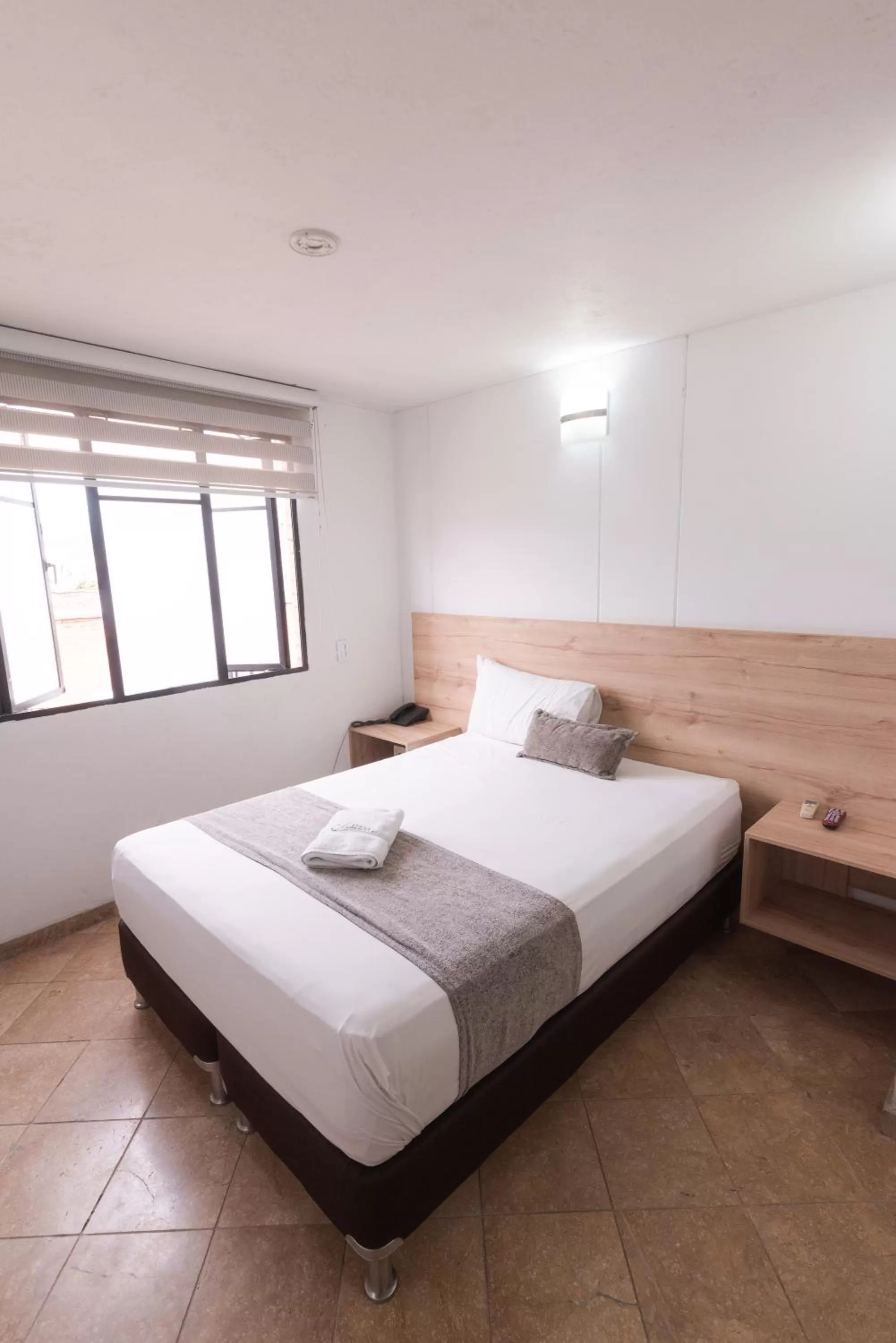 Photo of the whole room, Bed in Hotel Cabo de la Vela Medellin