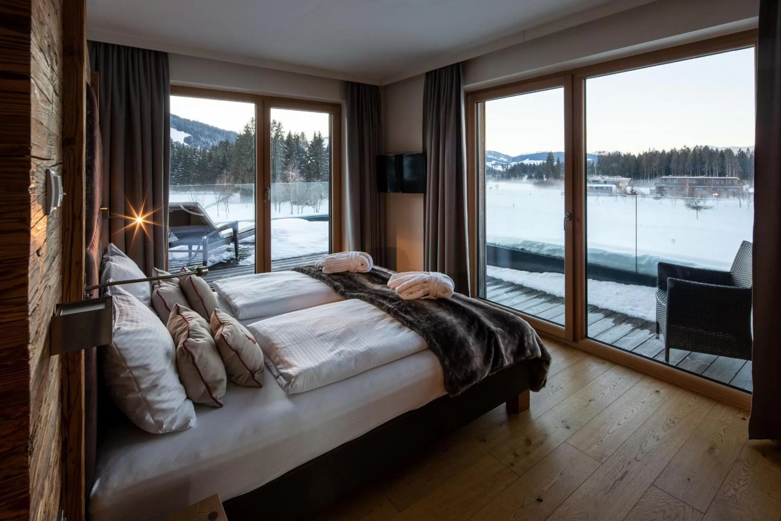 Photo of the whole room, Bed in Berg & Golf Resort Westendorf by ALPS RESORTS
