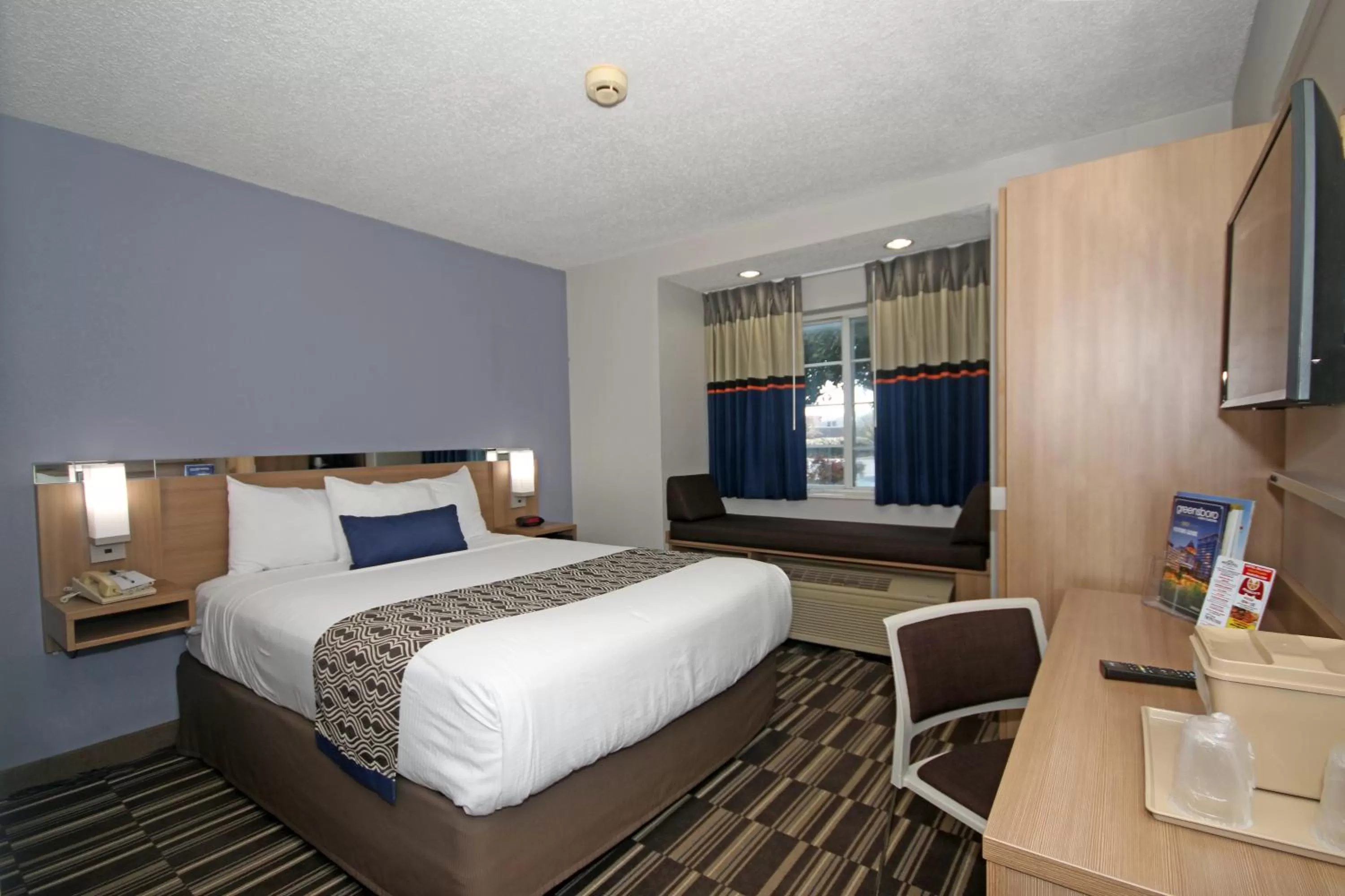 Photo of the whole room, Bed in Microtel Inn by Wyndham Greensboro