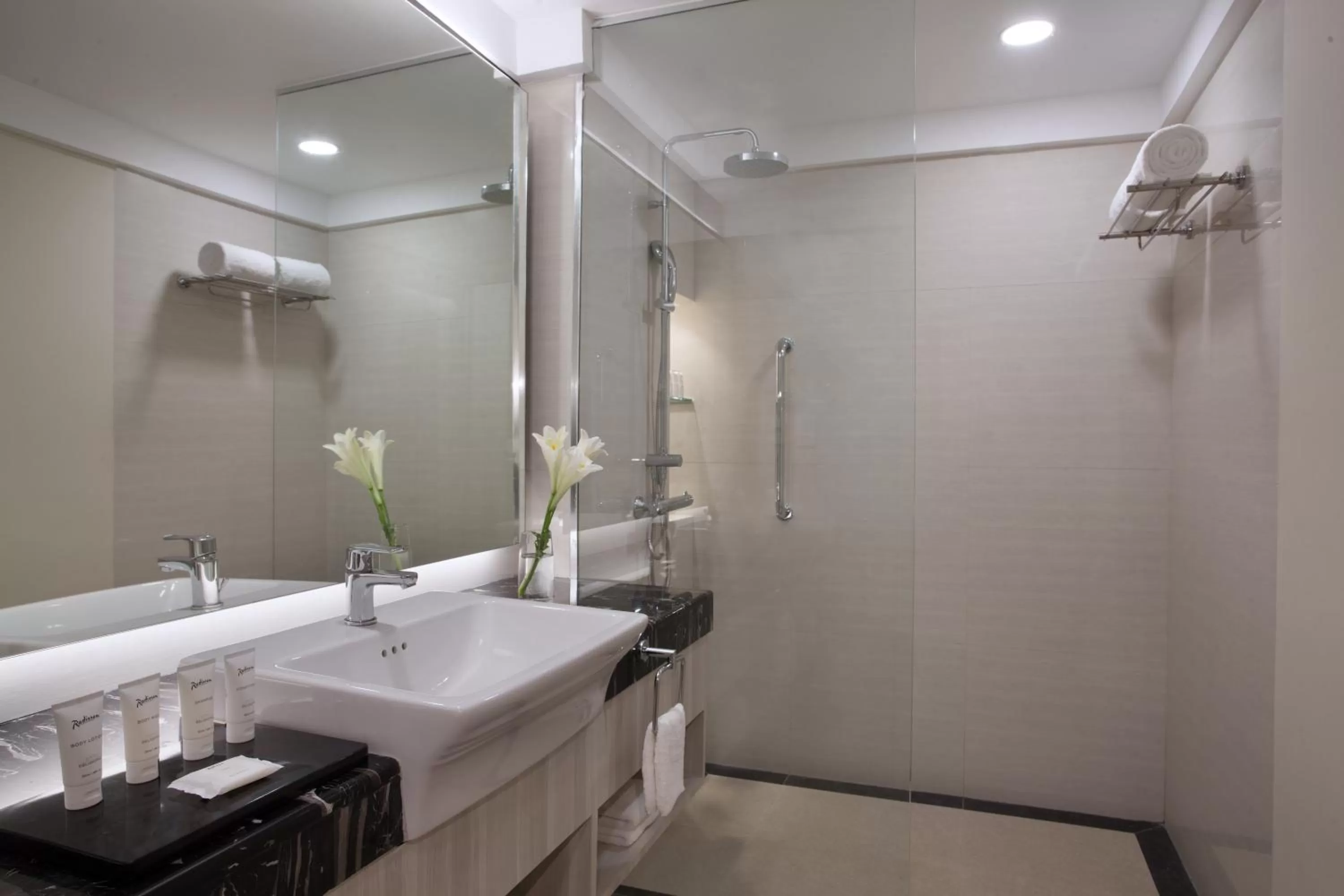Bathroom in AIHO Hotel Medan
