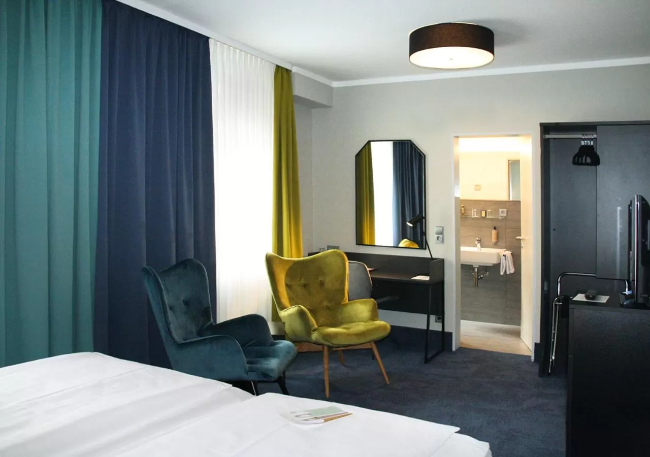 Photo of the whole room, Seating Area in AVIA Hotel