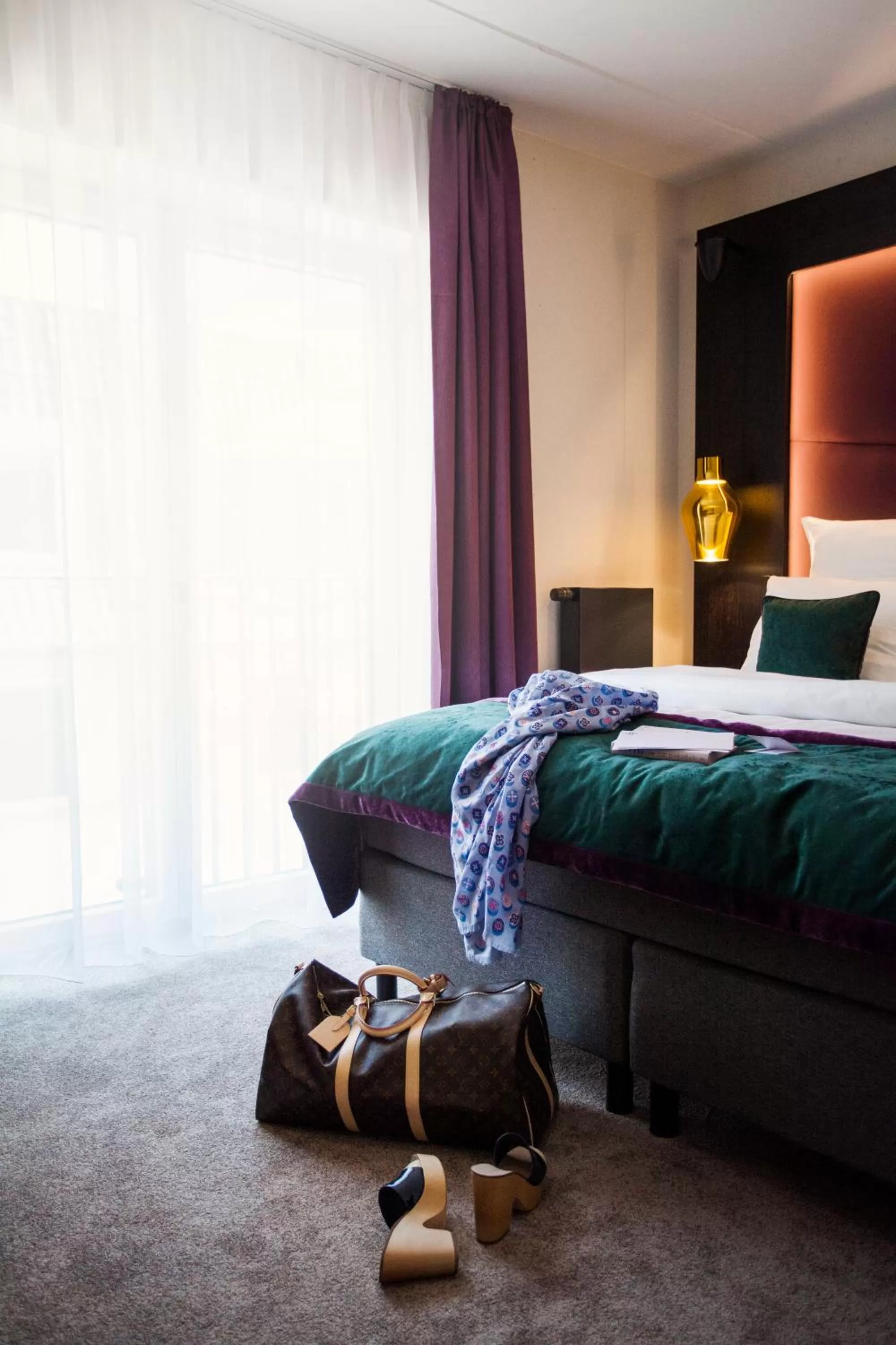 Bed in ONNO Boutique Hotel & Apartments