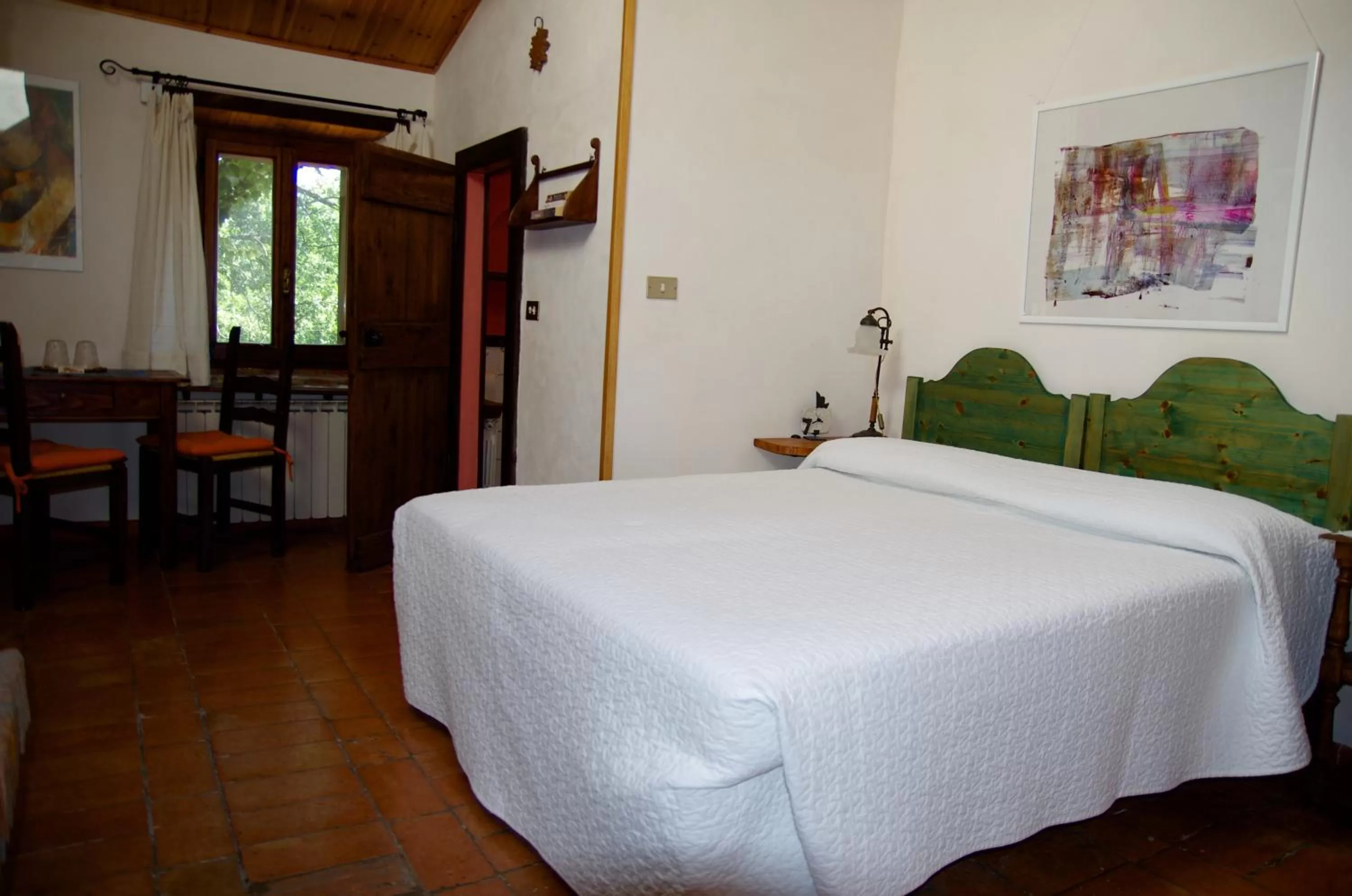 Photo of the whole room, Bed in Podere Pinzicalari