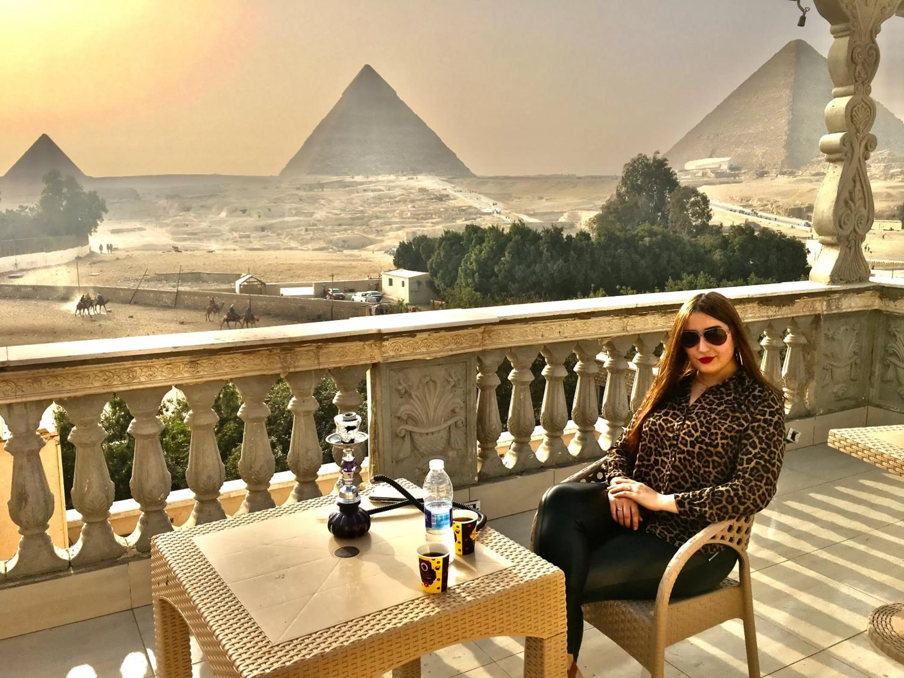 Sphinx palace pyramids view