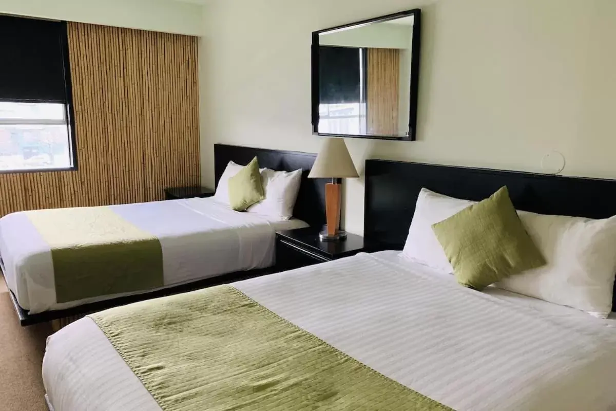 Queen Room with Two Queen Beds in Hotel at the Waldorf Queen Room with Two Queen Beds in Hotel at the Waldorf