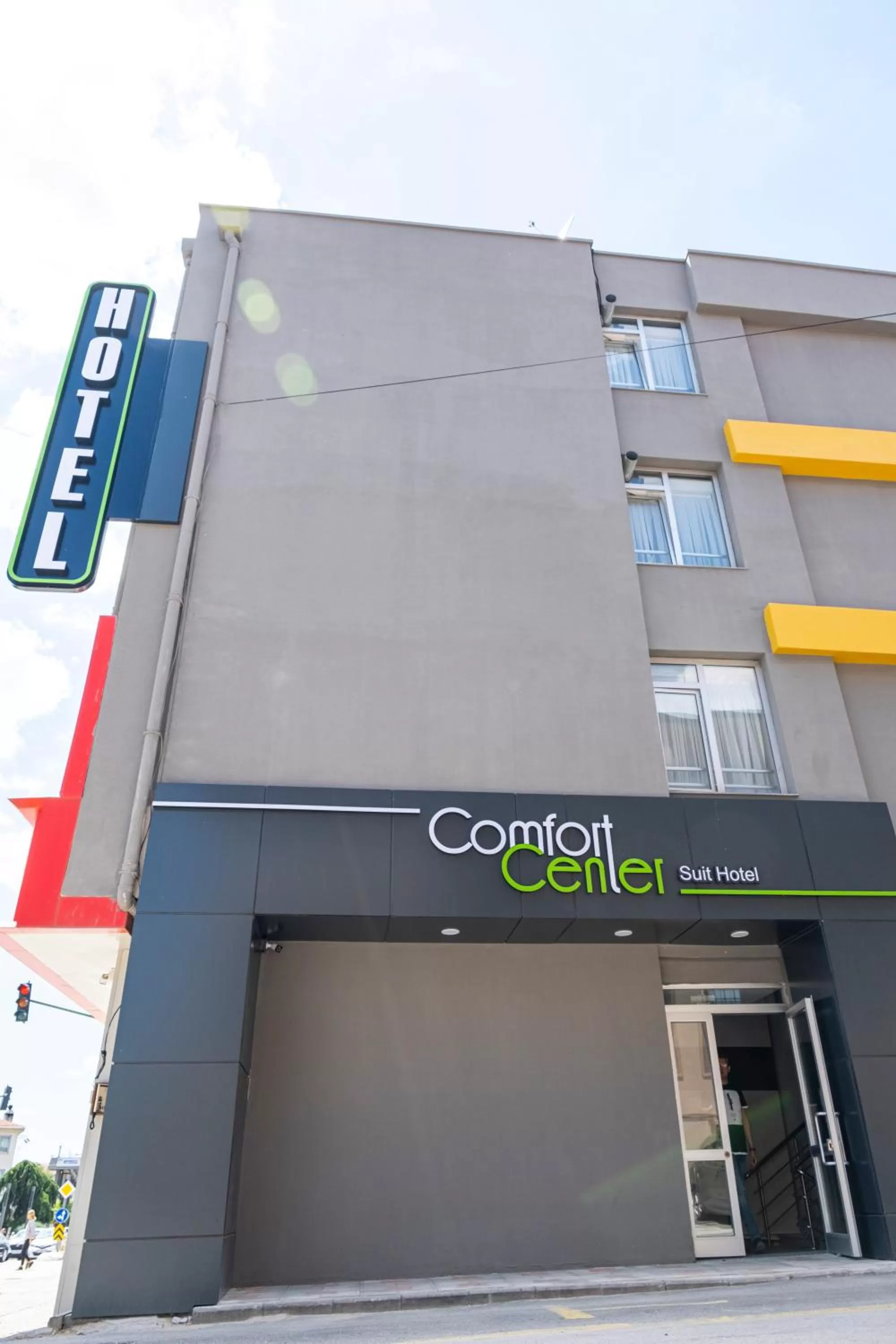 Property building in Comfort Center Suit Hotel