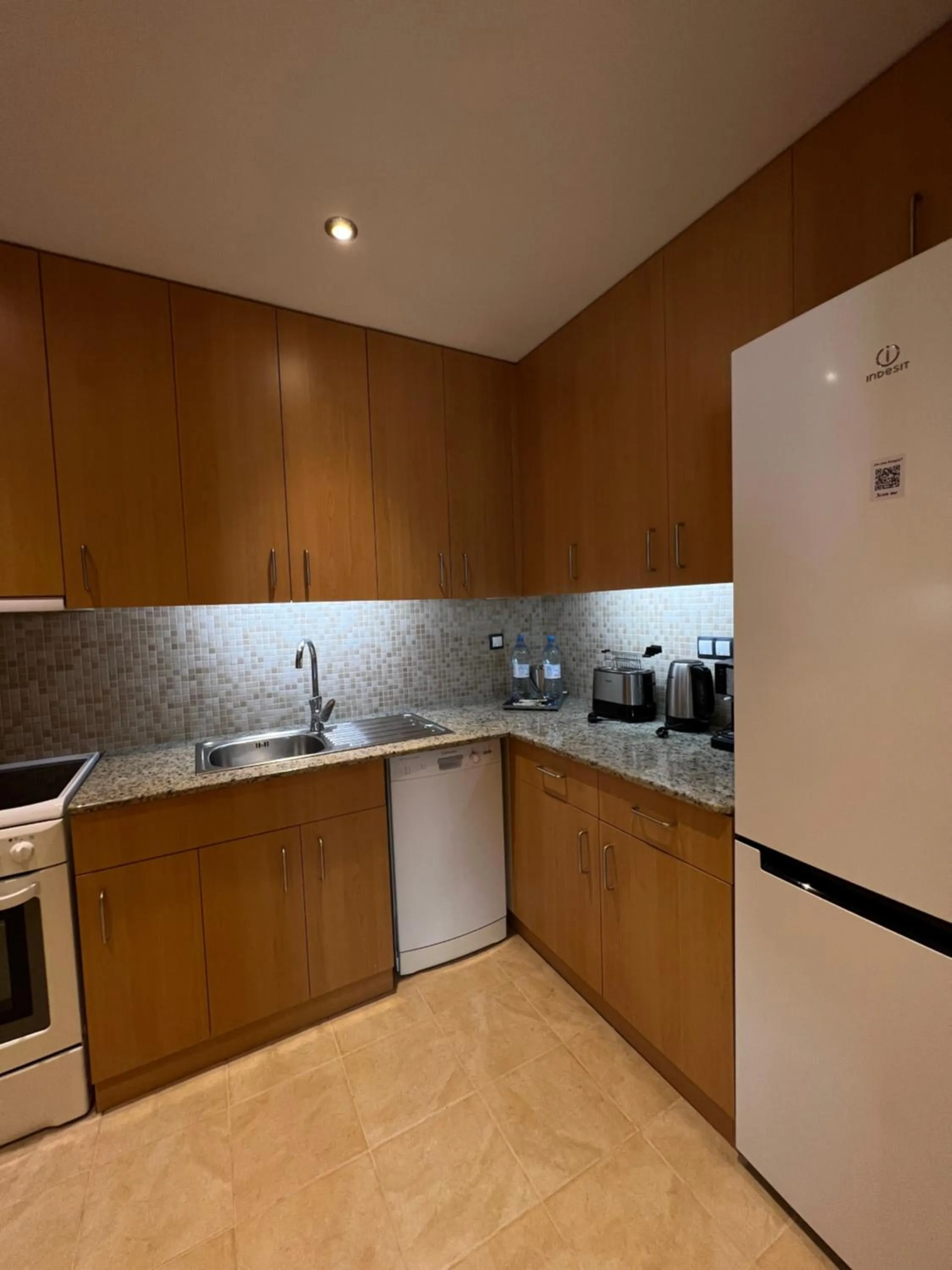 Coffee/tea facilities in Atyrau Executive Apartments