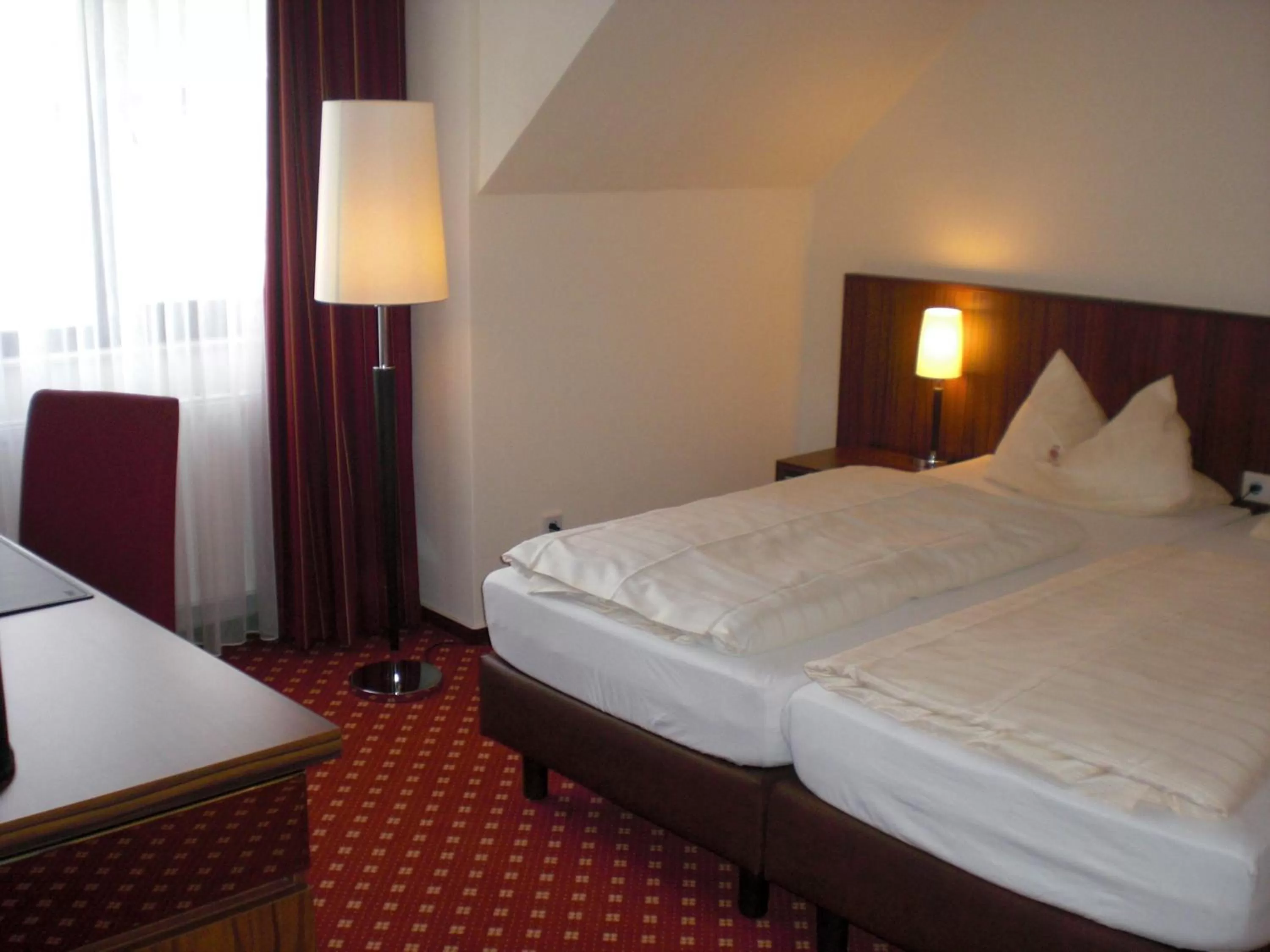 Bed in Akzent Hotel Jonathan