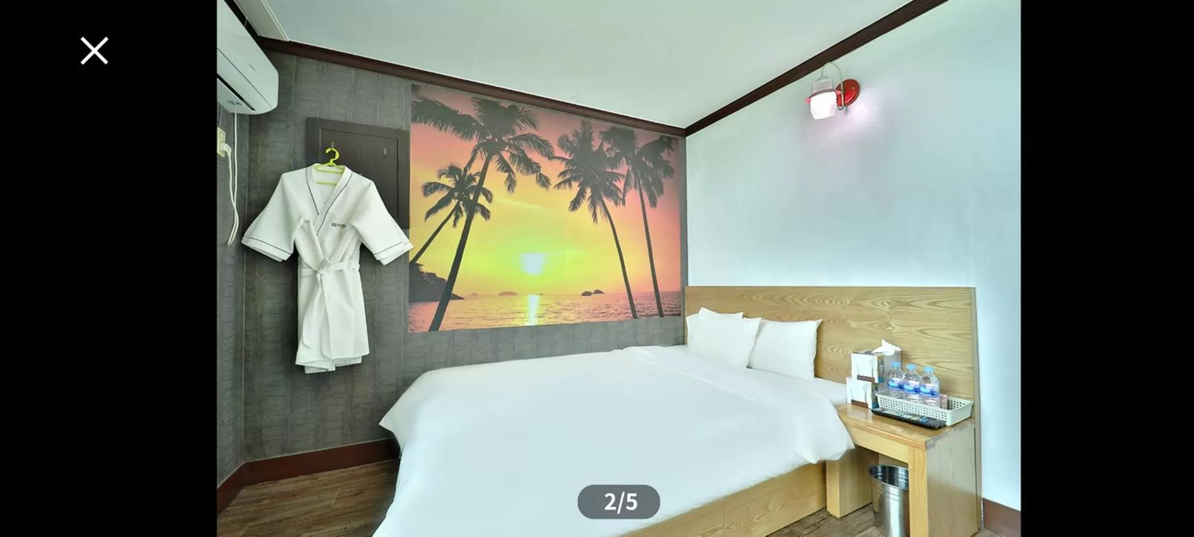 Bed in Saipan Motel with Sea View