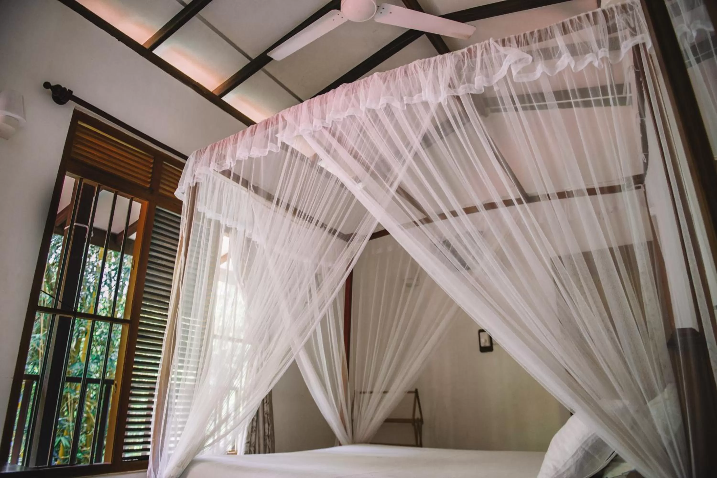 Bed in Kadolana Guest House