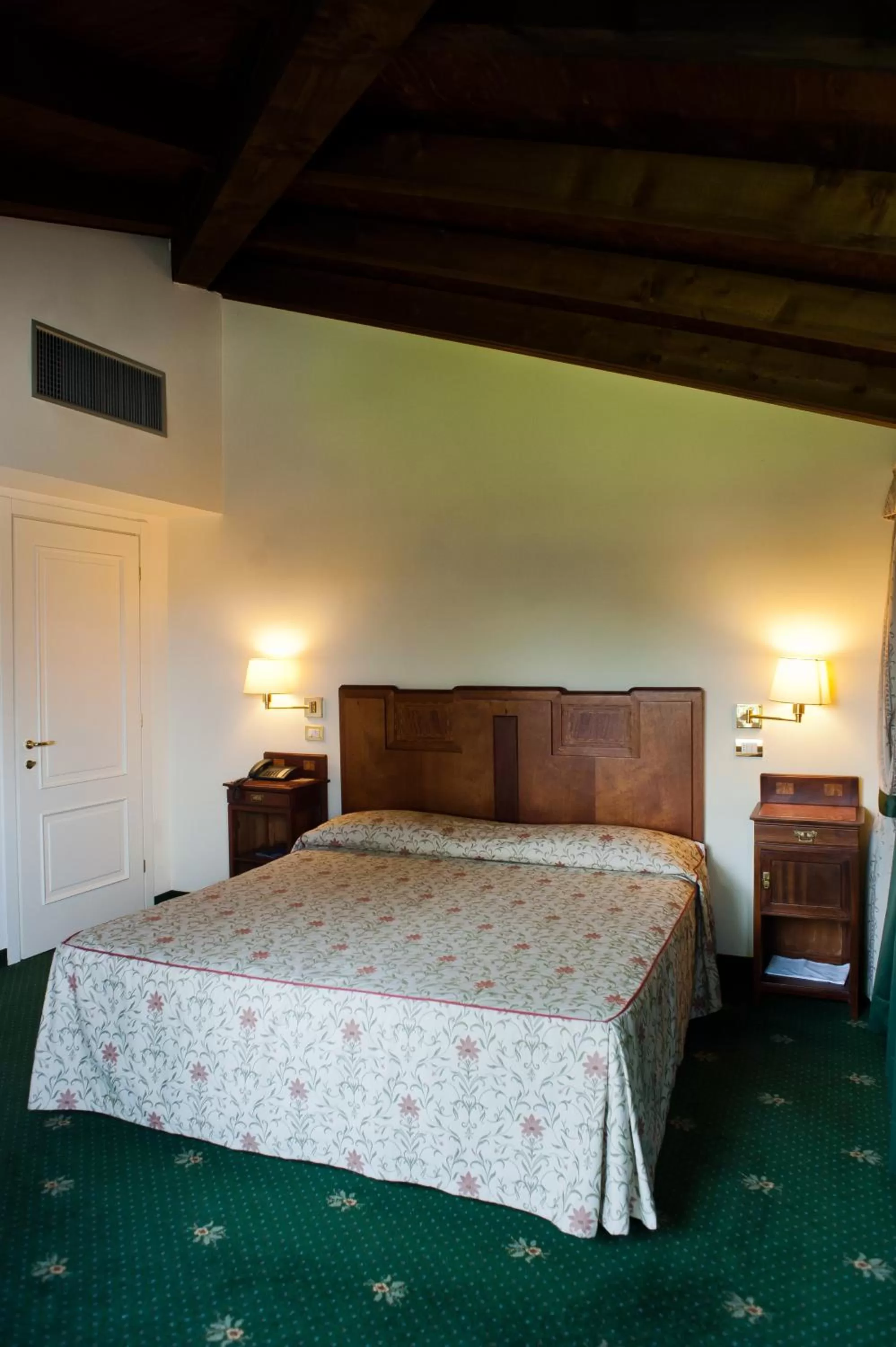 Bed in Hotel Candiani