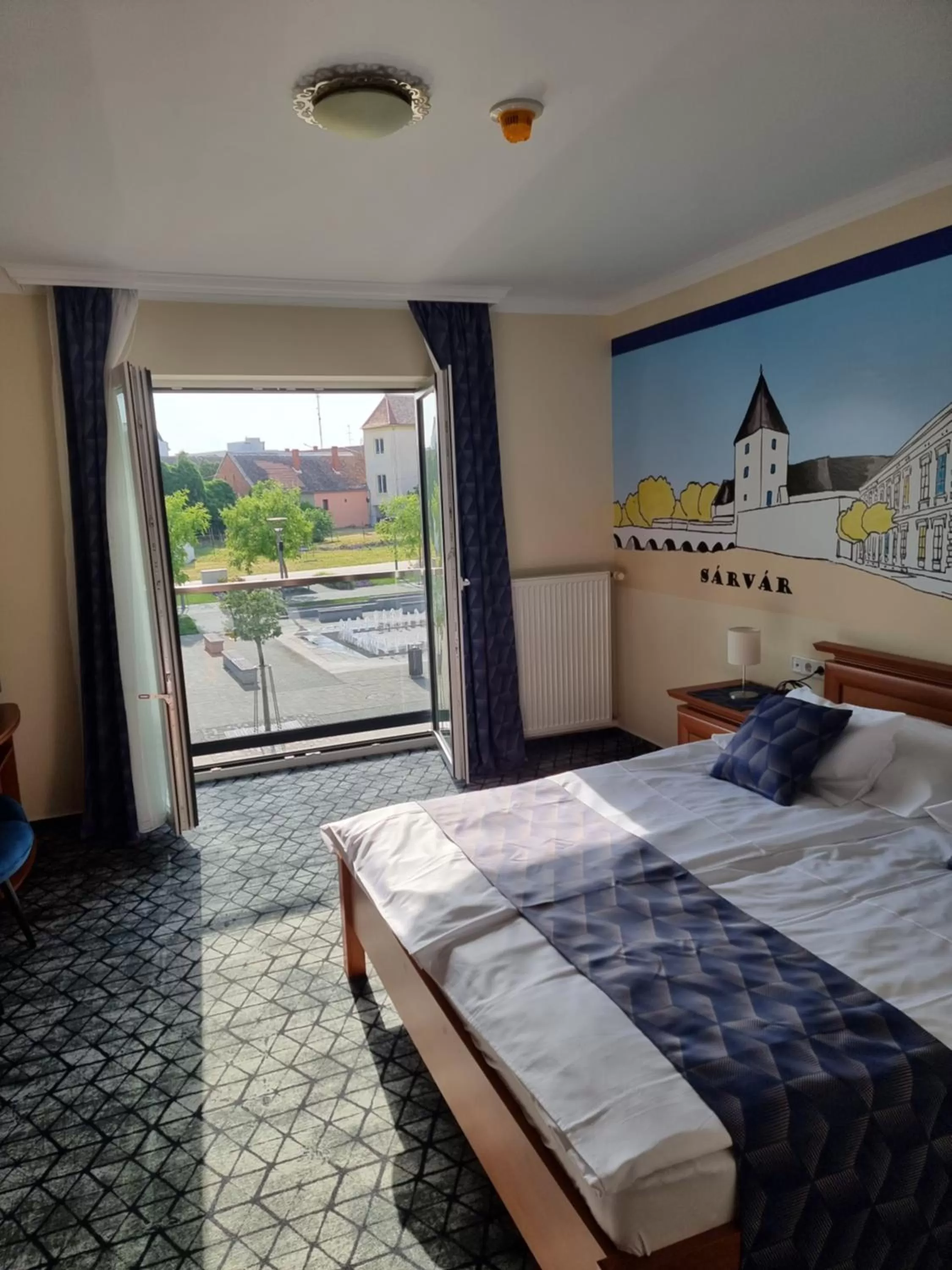 View (from property/room), Bed in Hotel Viktória