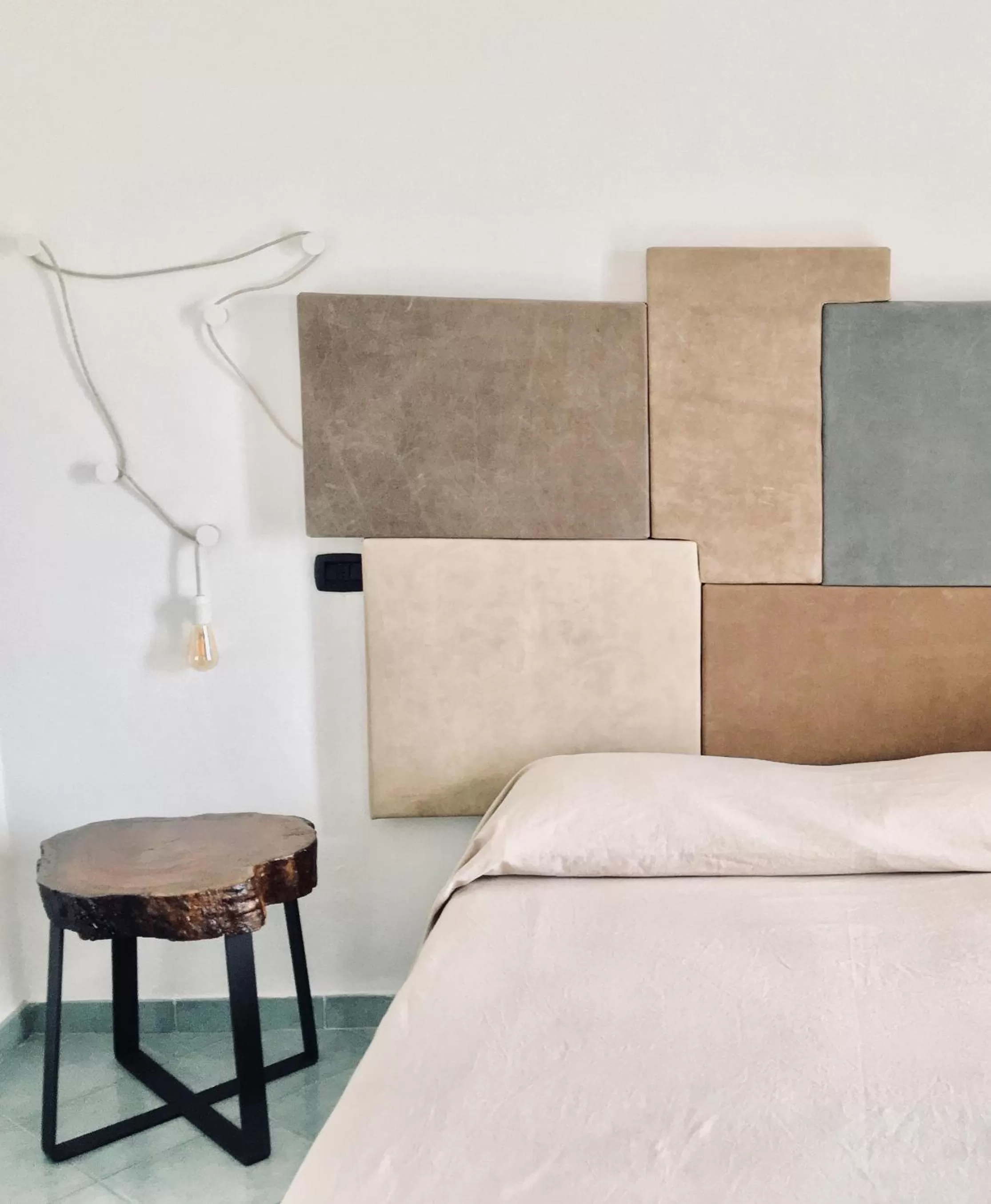 Bedroom in Black Market Hotel