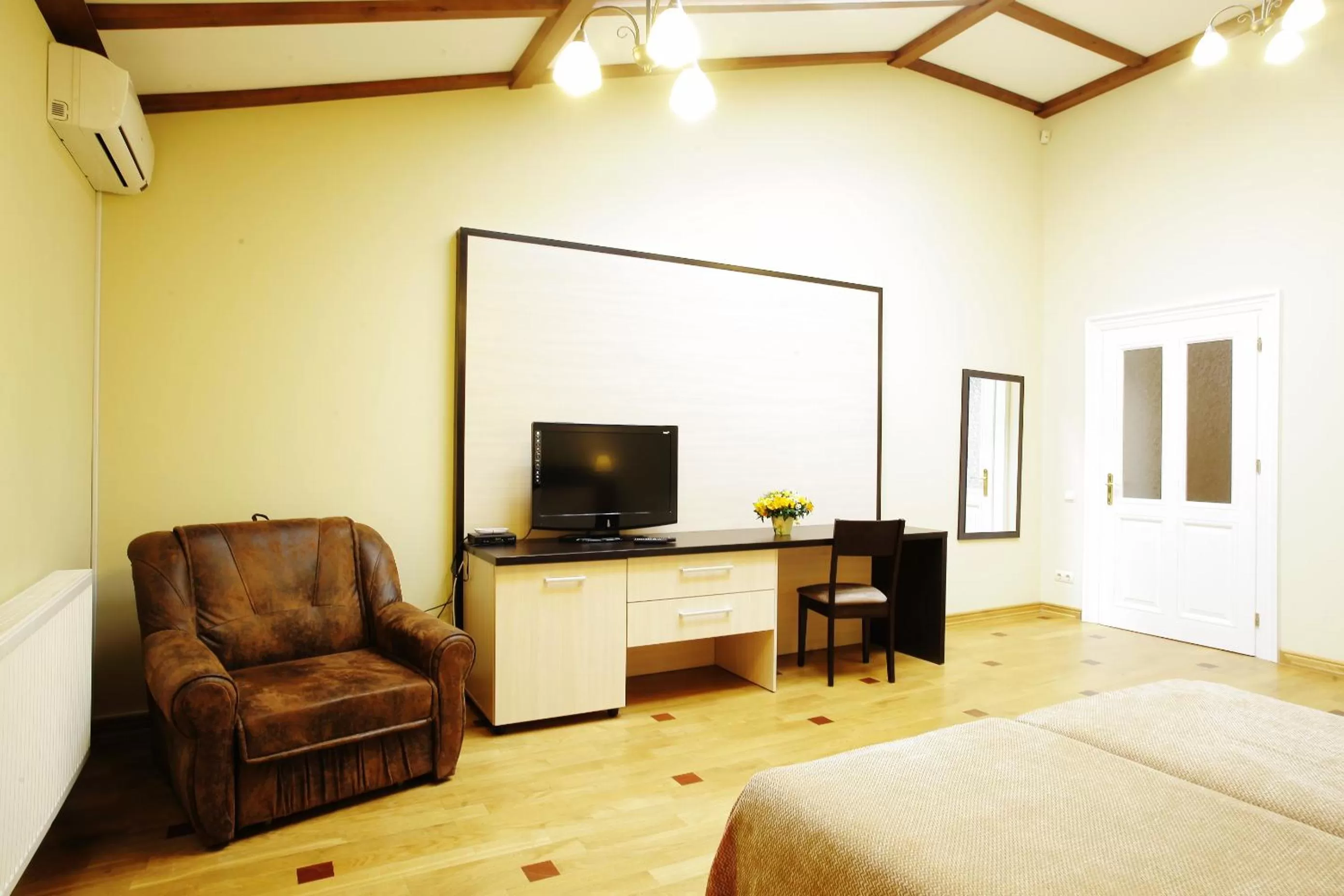 Photo of the whole room, TV/Entertainment Center in Mini-Hotel Under The Roof