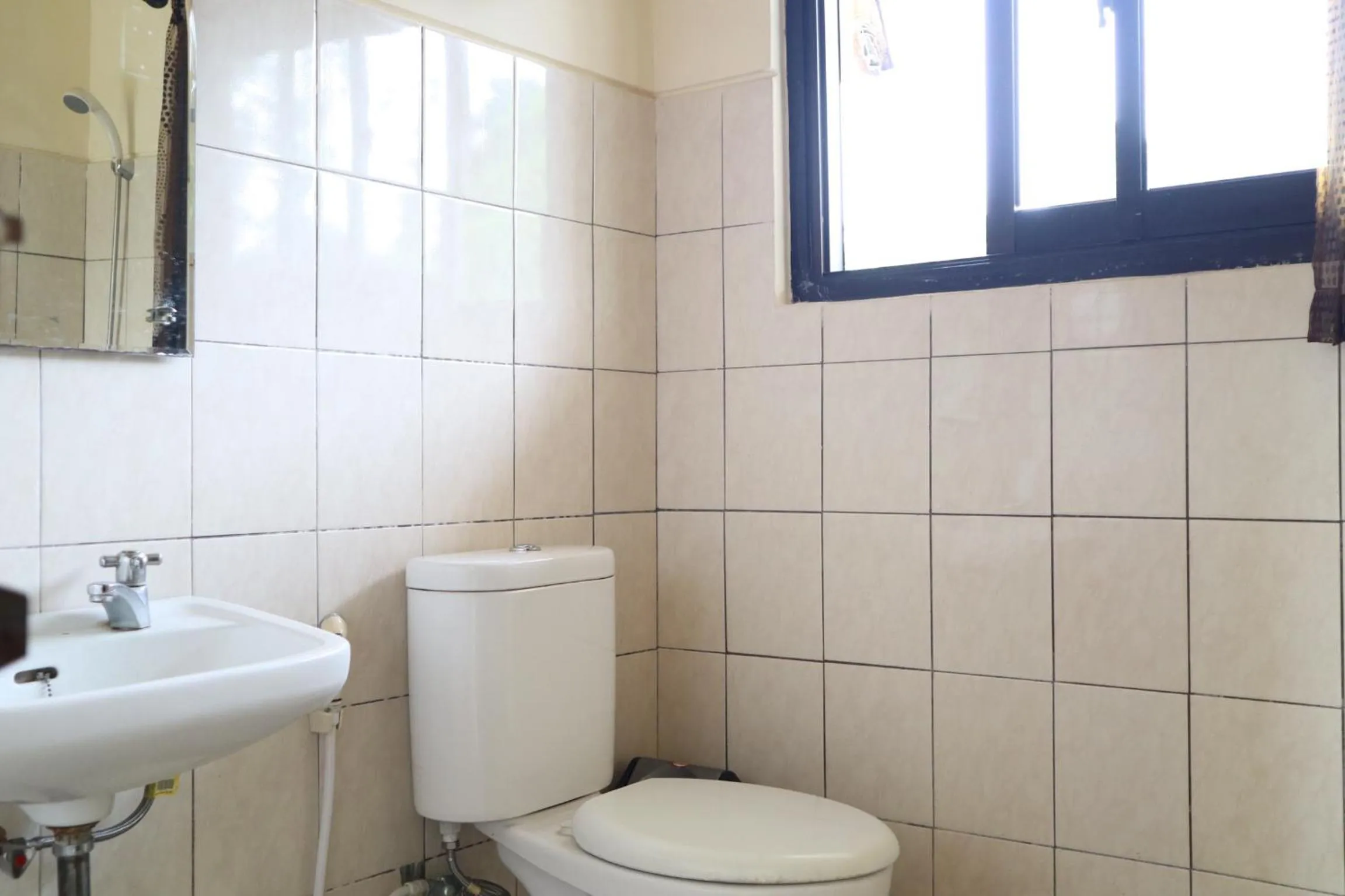 Bathroom in Wijaya Guest House Ubud