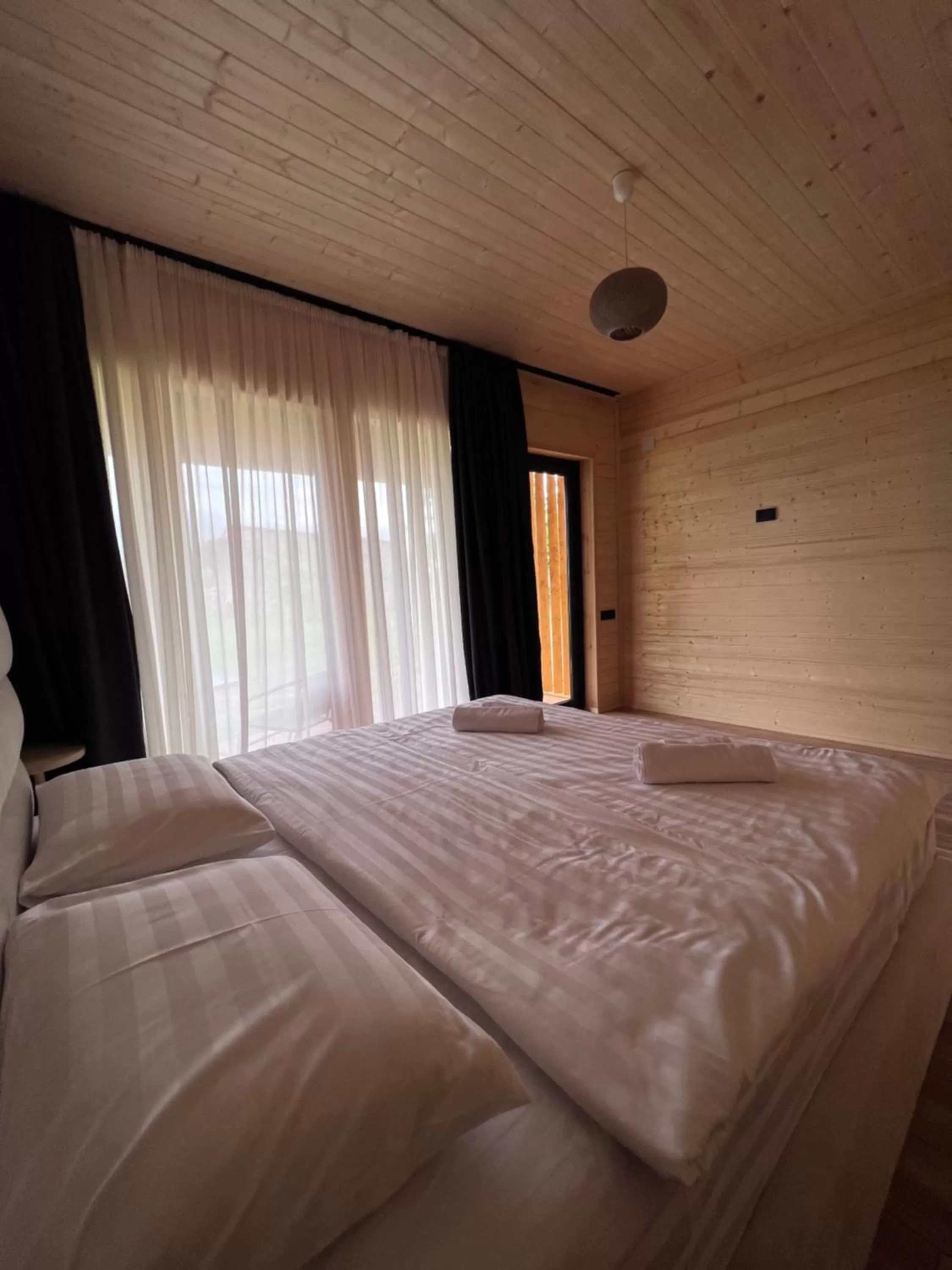 Bed in Chubini Winery & Cabins