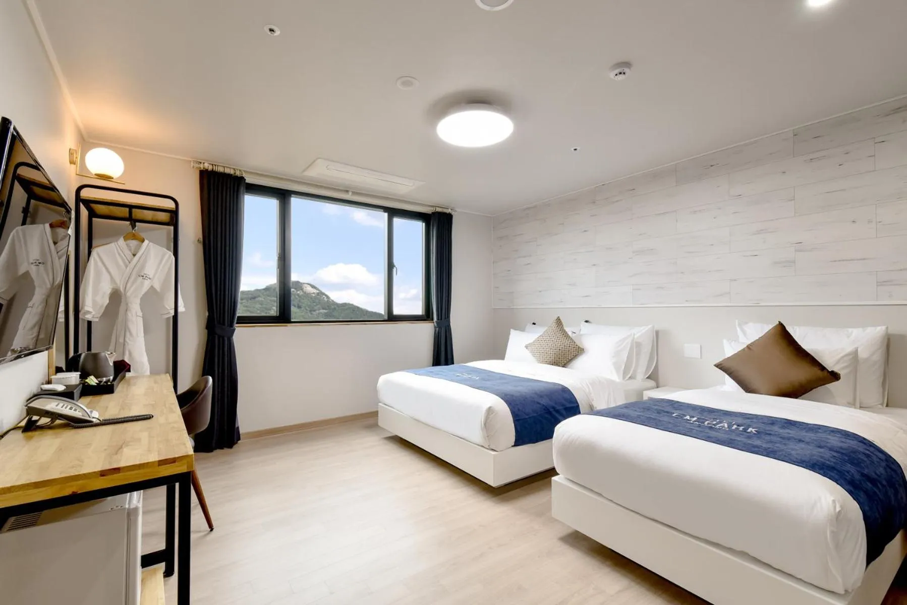 Bed in CM Park Hotel