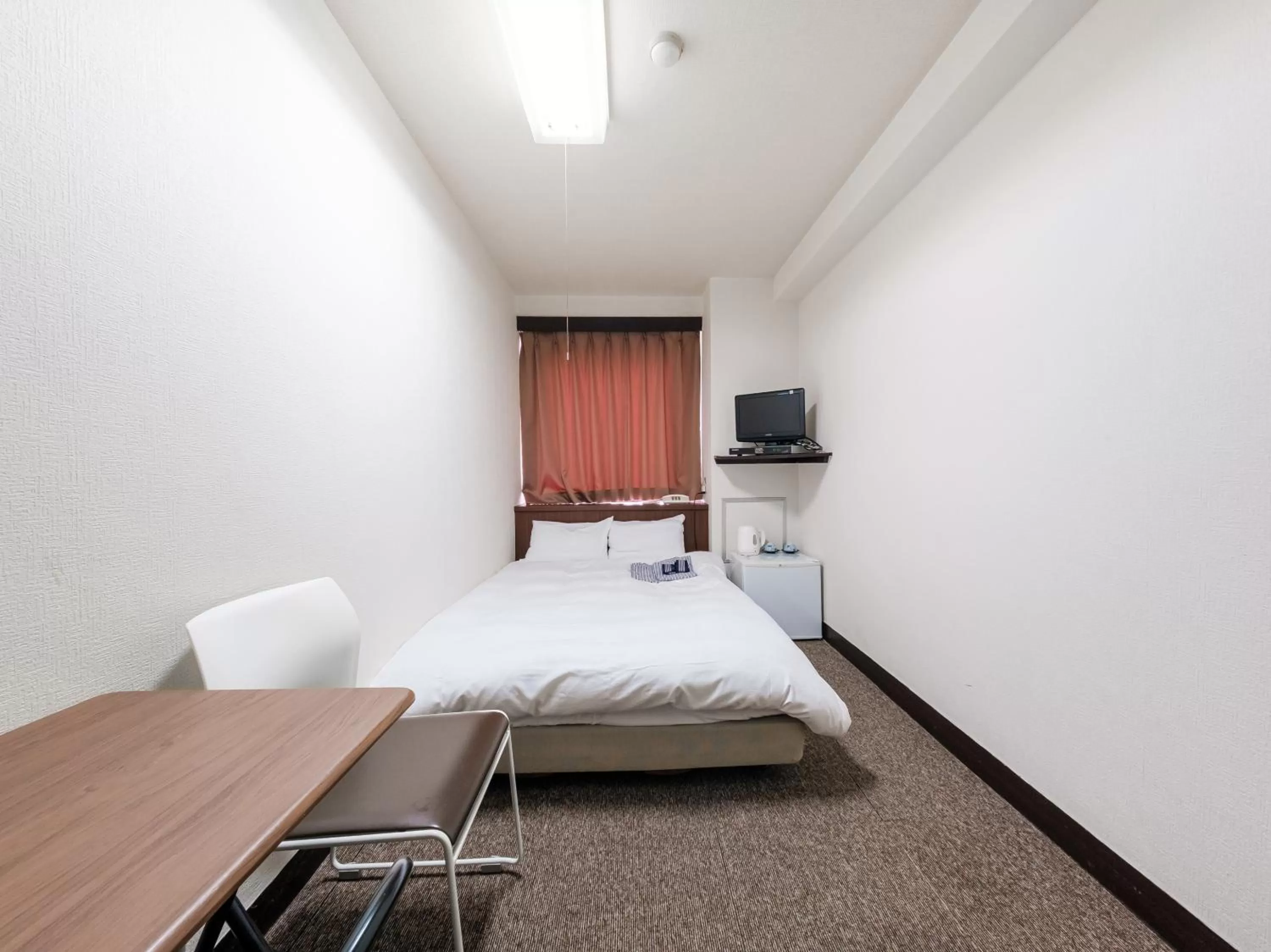 Bed in Tabist Hotel Tetora Hakodate Station